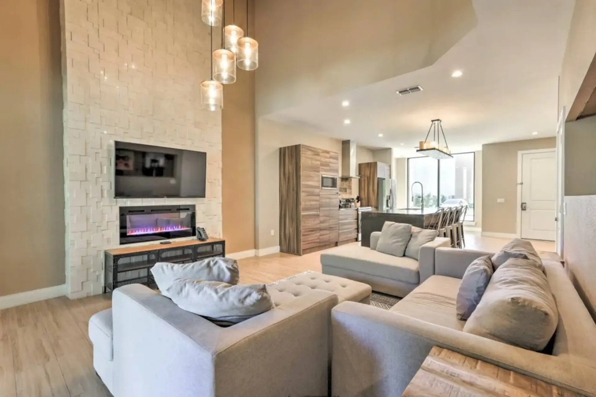 Enjoy a modern, spacious living room designed for comfort and style, perfect for relaxing, entertaining, or spending quality time together.