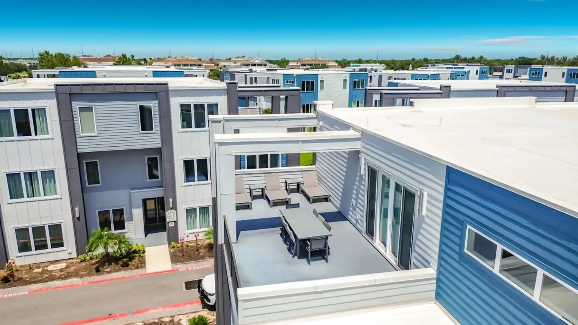 Private rooftop terrace with outdoor dining and lounge seating