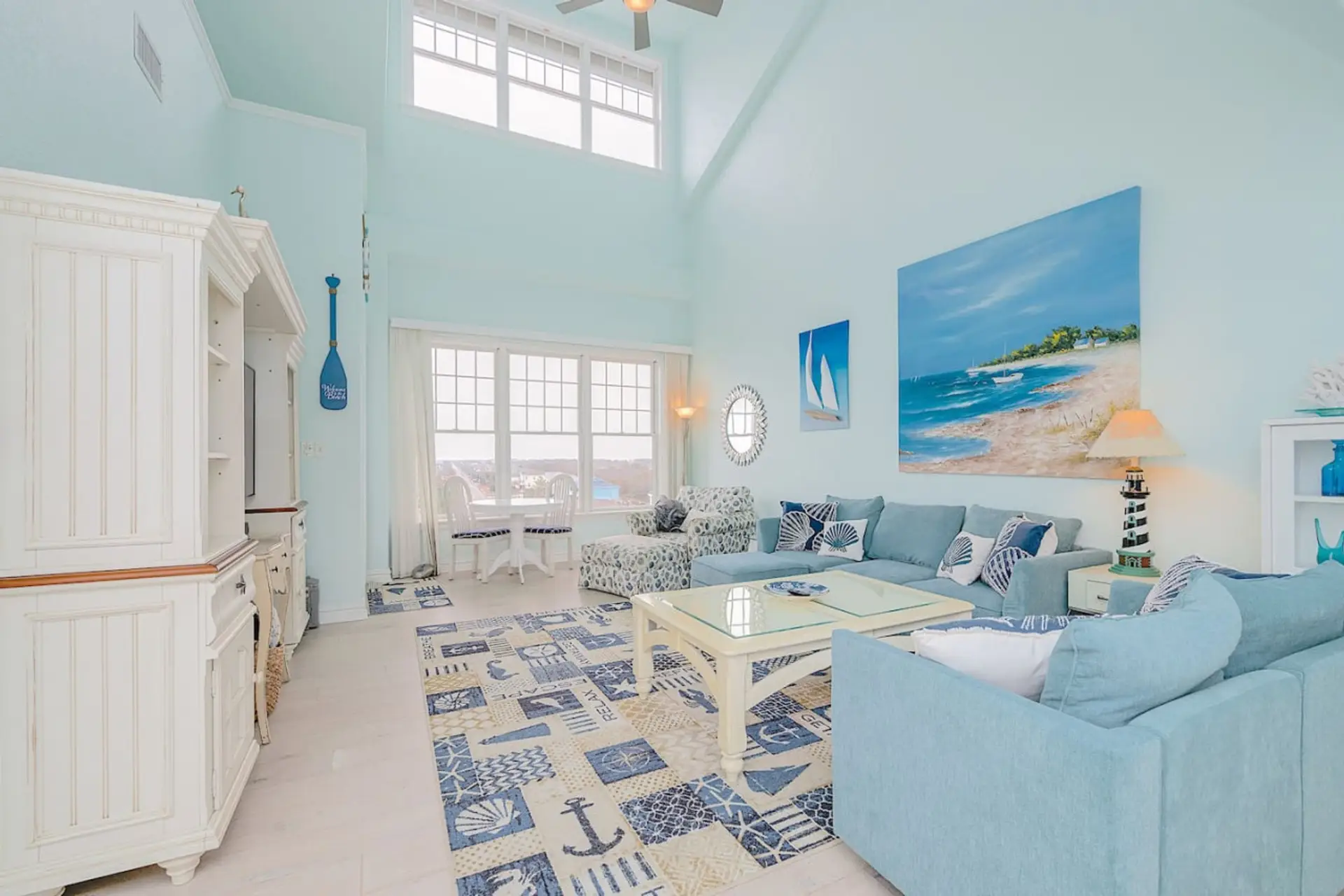 Light, bright, and beachy 🌊 Vaulted ceilings, coastal décor, and plenty of space to relax after a day by the ocean.
