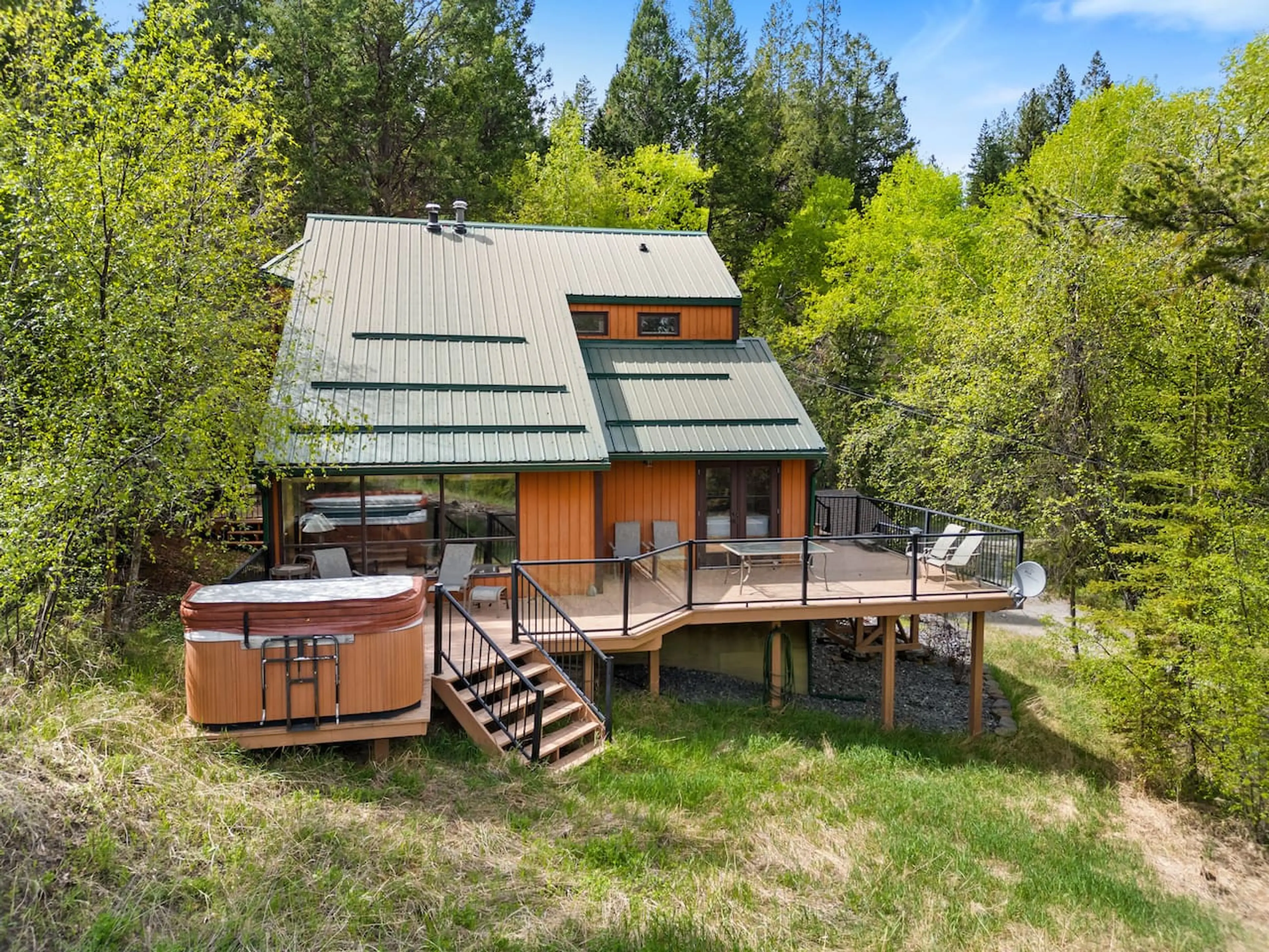 Exterior of Evergreen Escape, tucked in the trees of Fairmont Hot Springs.