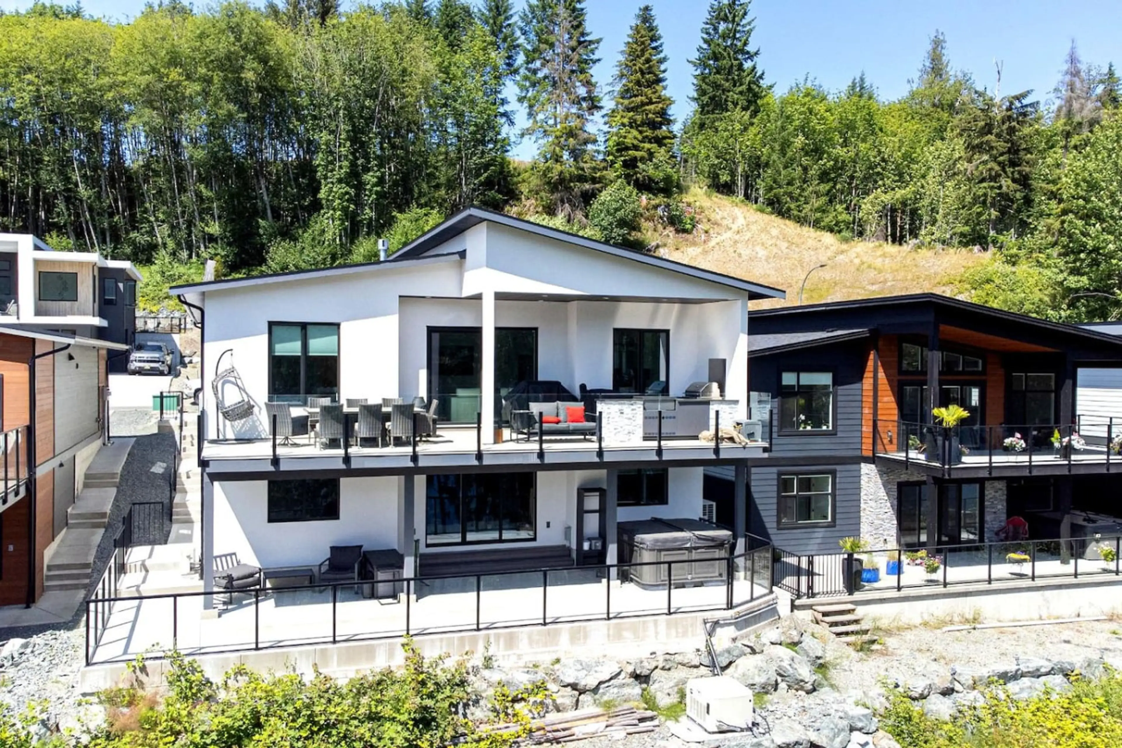 Exterior of Cowichan Lake Escape, a walkout suite just a few minutes' walk to the private beach & marina.