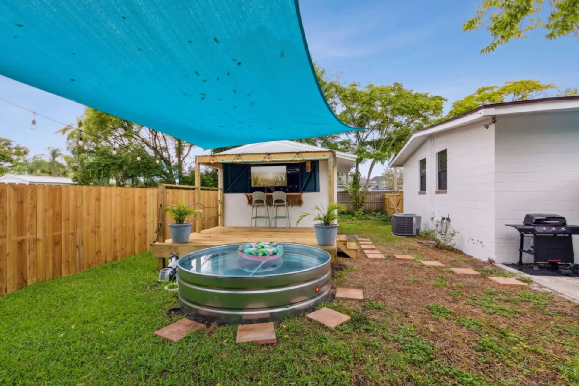 Enjoy watching TV from the pool!