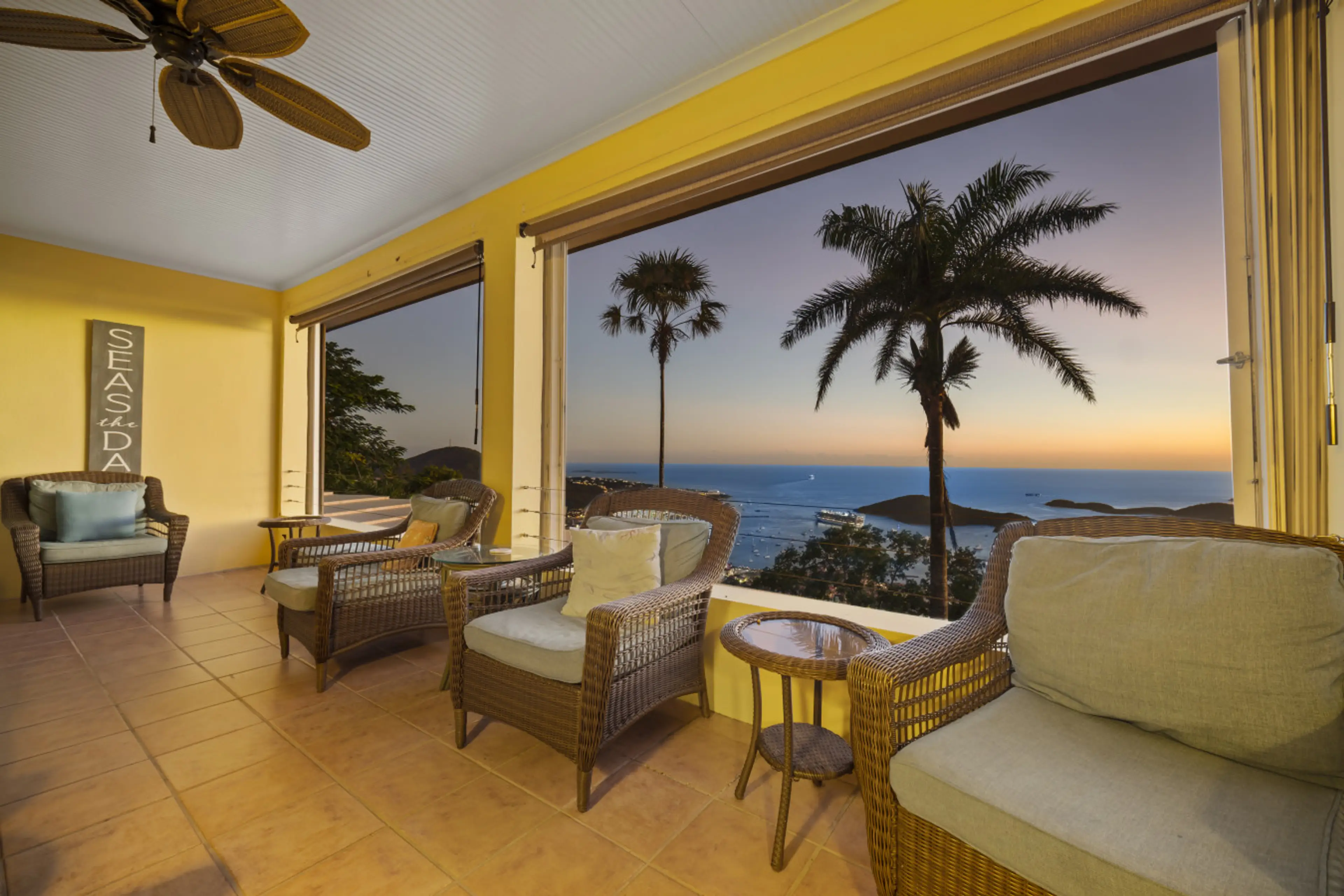 The main level's covered balcony overlooking the pool deck and the Charlotte Amalie Harbor!