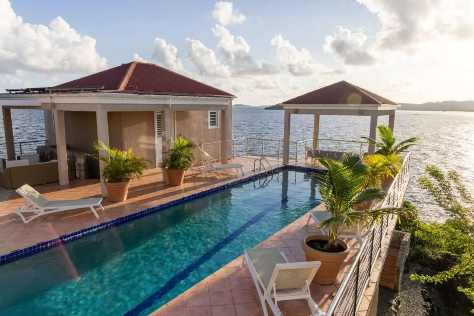 A 50-foot lap pool overlooking the Caribbean Sea, perfect for sunrise swims or sunset cocktails.