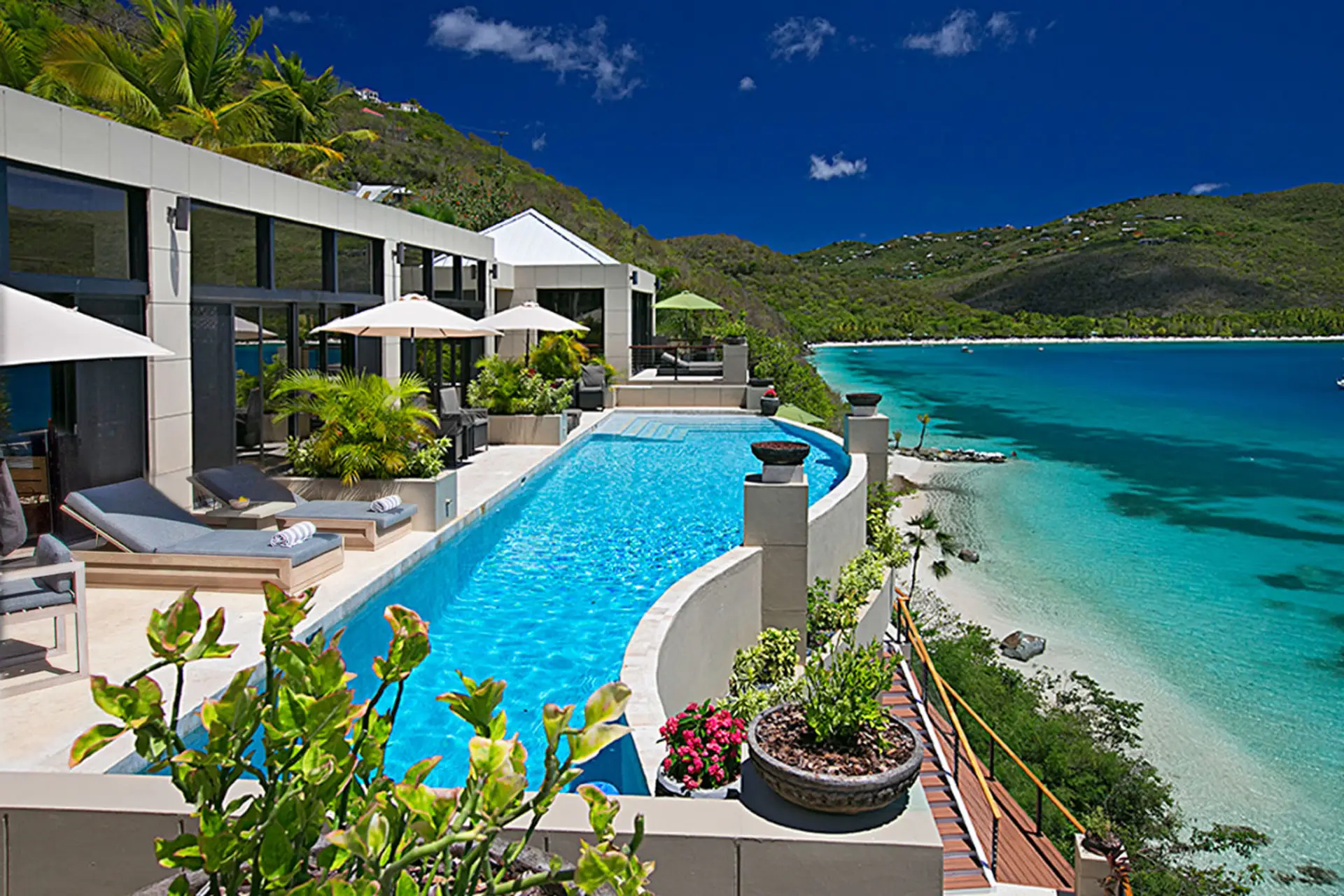 A view of the pool deck, with Magen's Bay Beach in the background.