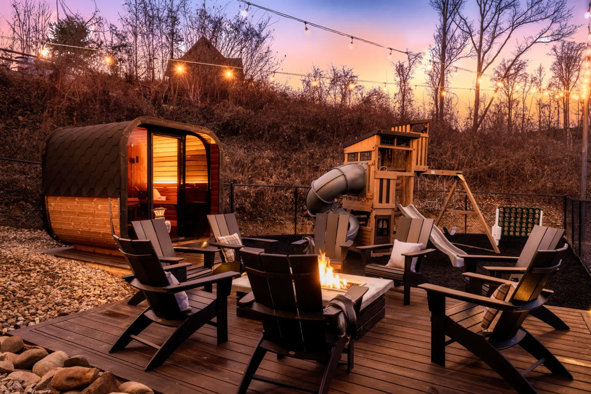 A dream yard with a sauna, fire pit and playground!