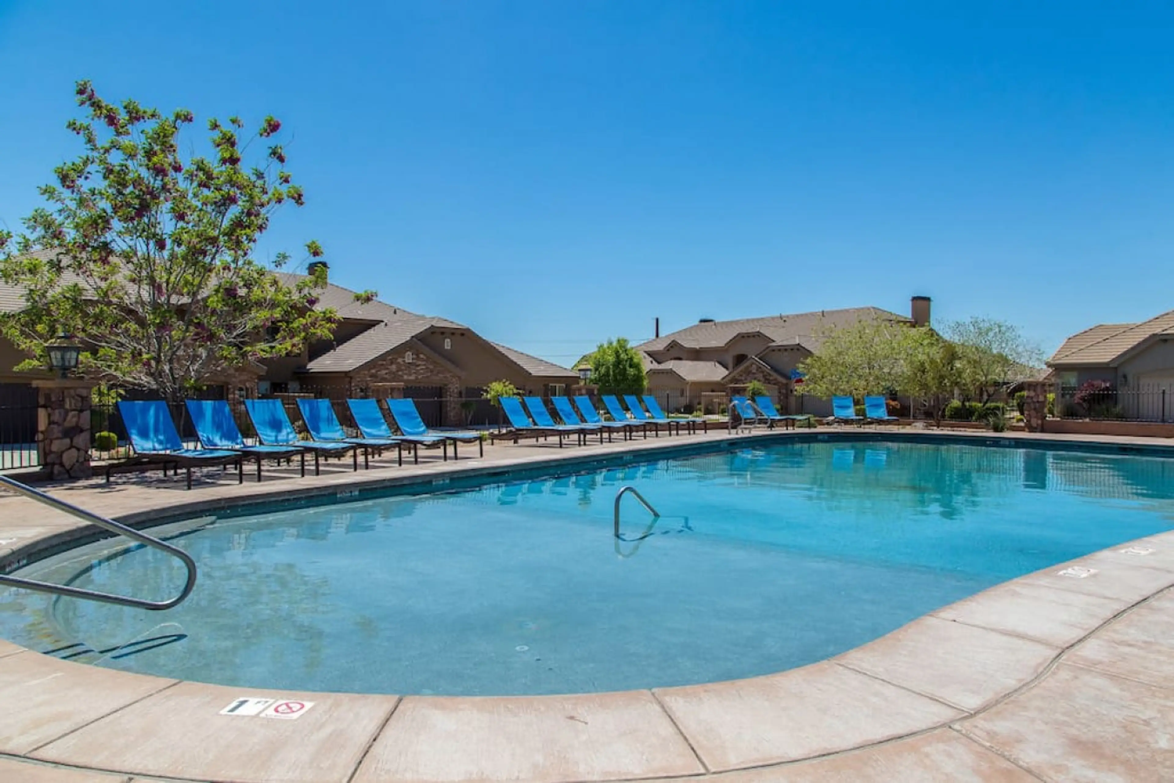 Community pool with plenty of seating