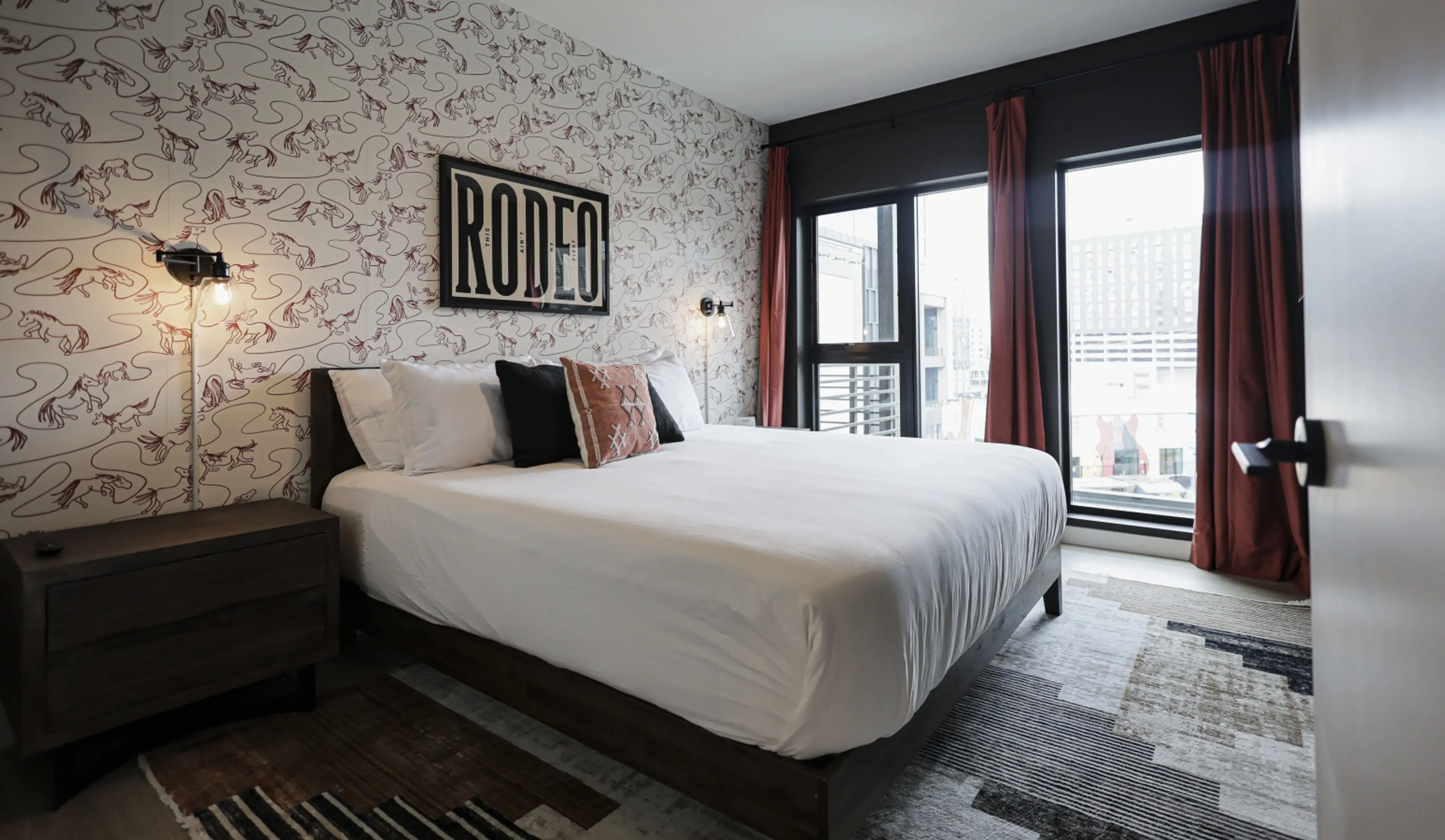 Spacious bedroom with hotel-quality linens and modern touches.