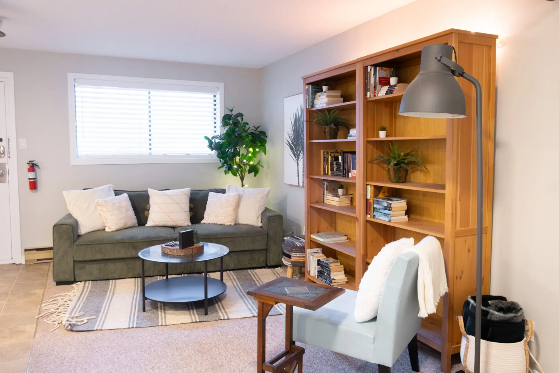 Cozy living room vibes at The Drift, perfect for relaxing after a beach day.