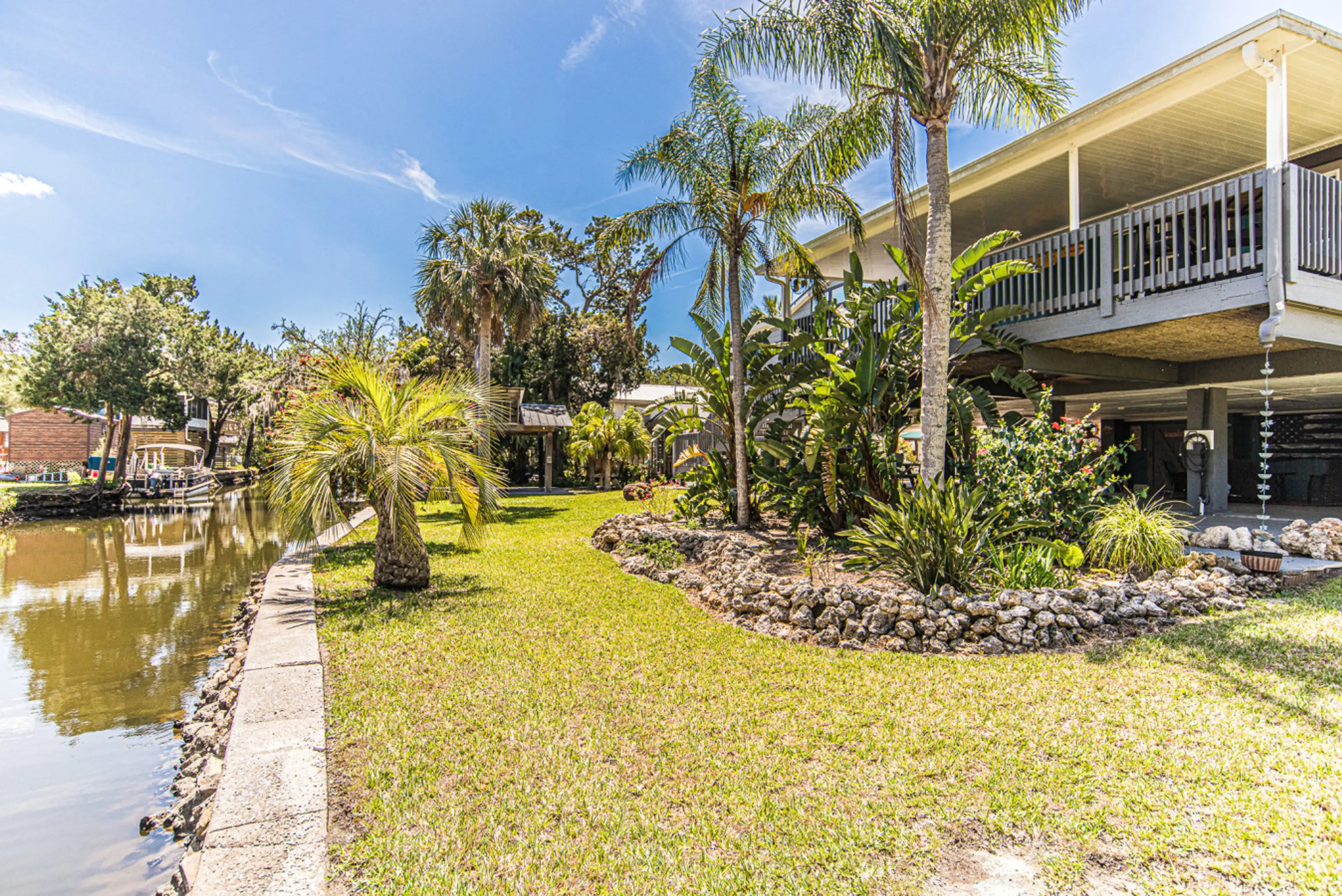 Canal front with firepit, boat dock, fish station and so much more!