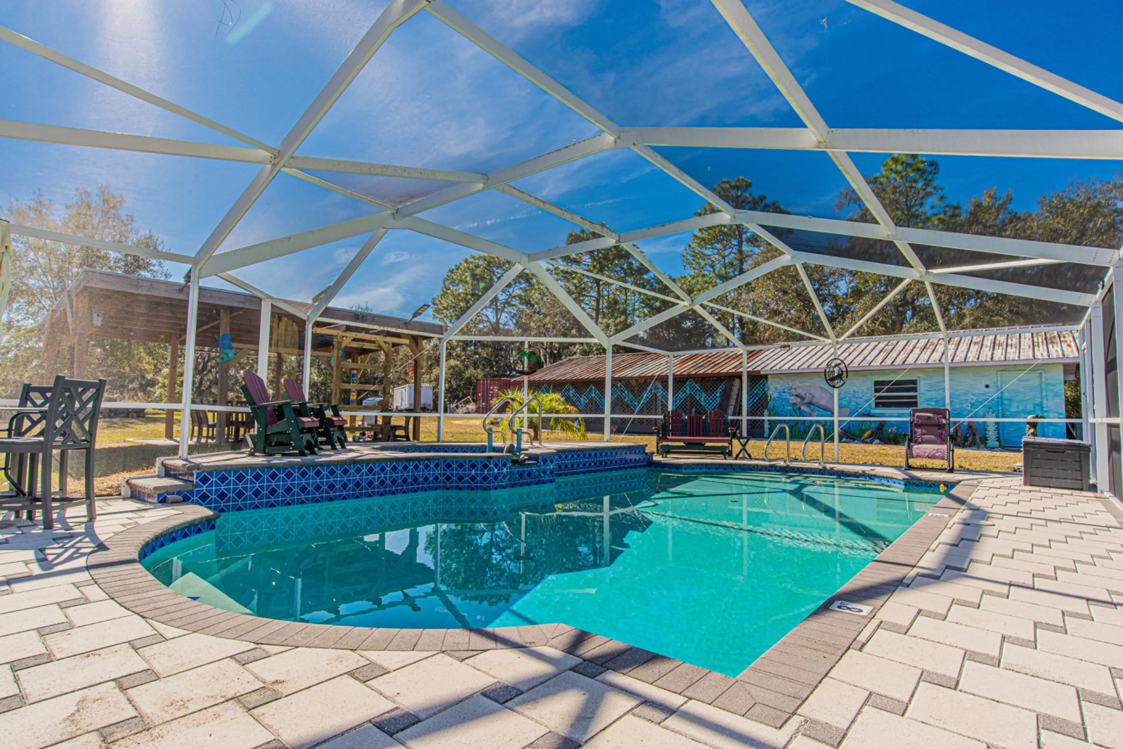 Mermaid Manor complete with pool and outside areas to hang, grill and chill.