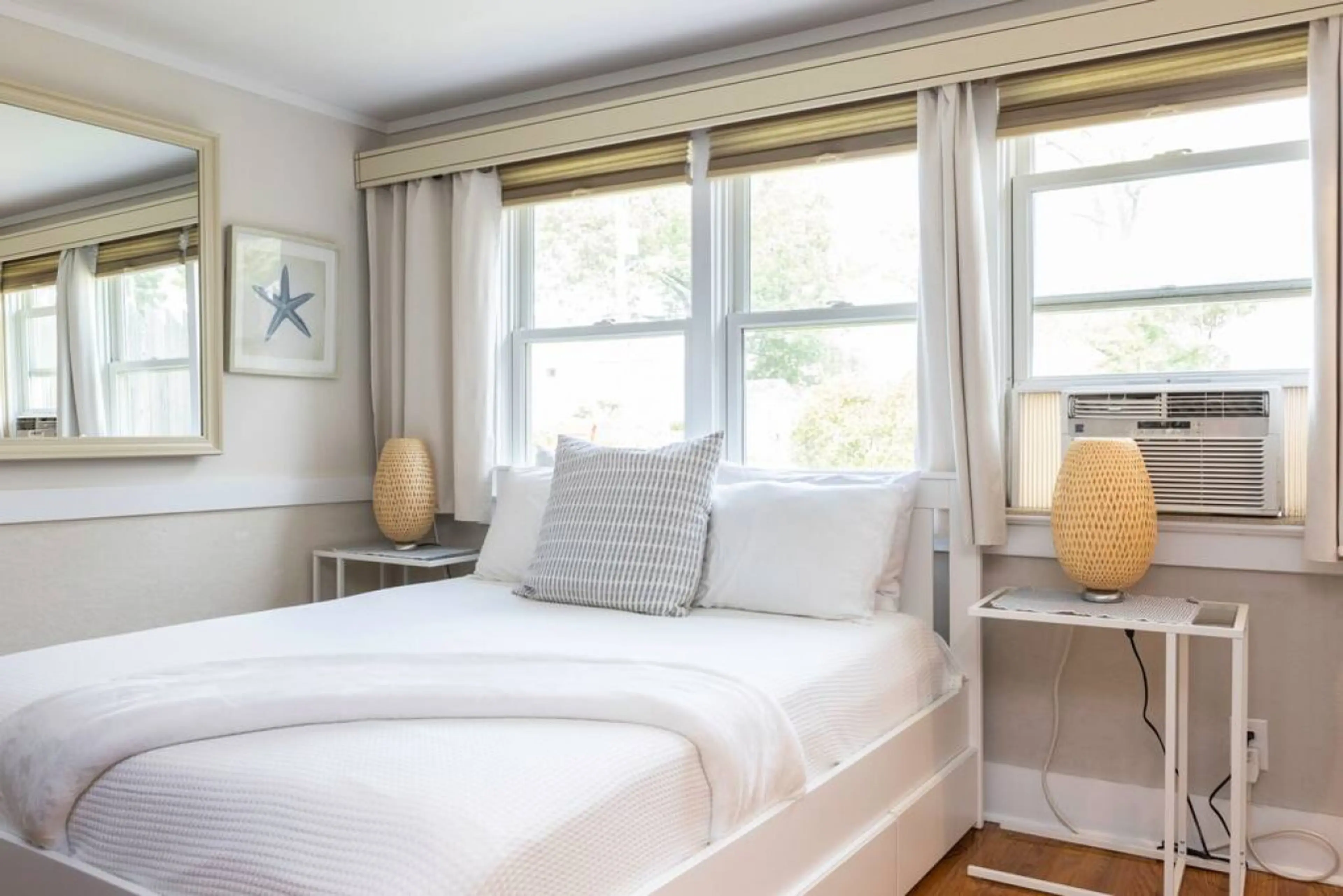 Your cozy queen bed with storage drawers underneath!