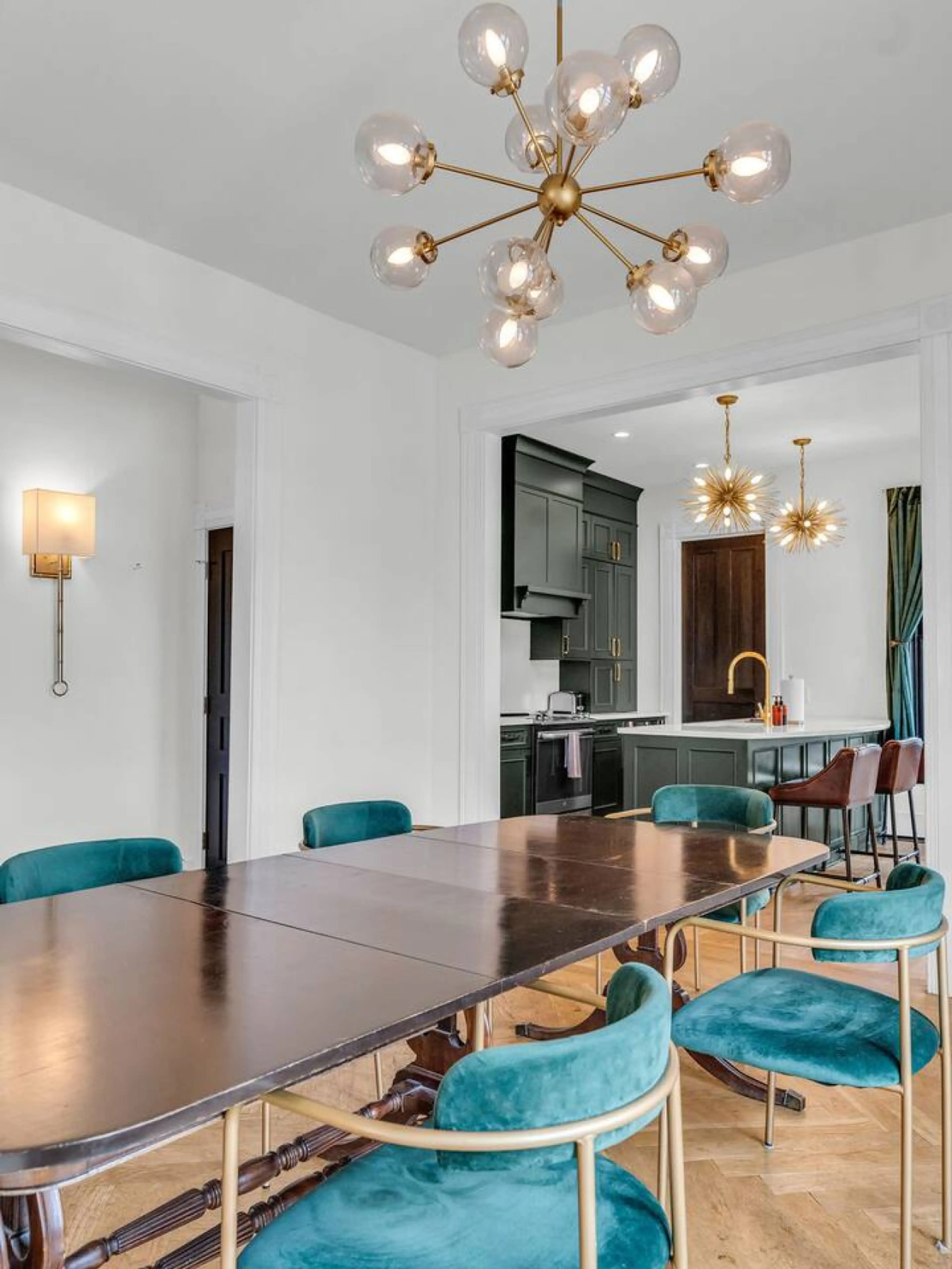 Dining Room: Elegant dining space with vibrant chairs and chic lighting for memorable meals!