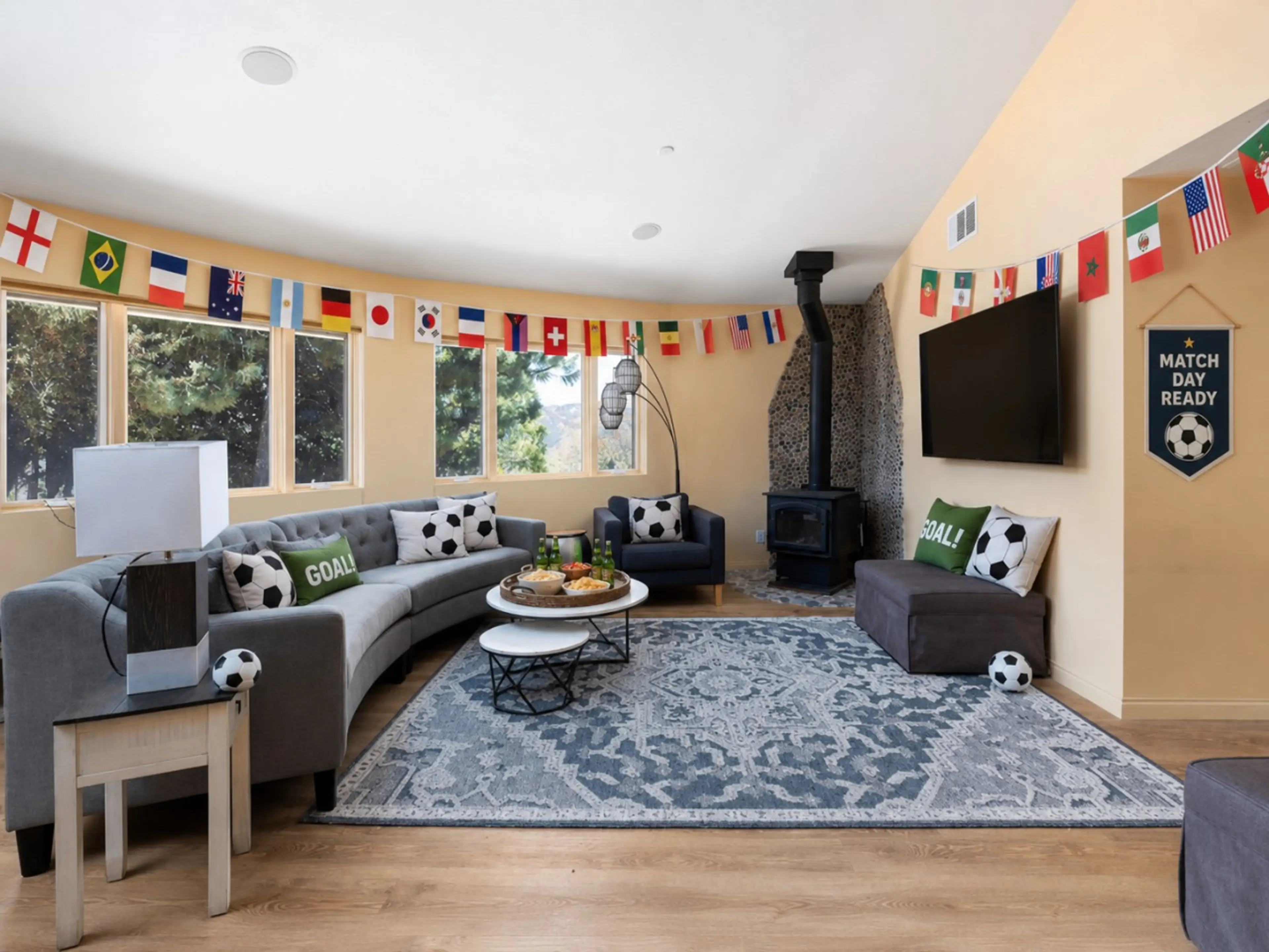 ⚽ Light & airy living room with cozy wood stove — match-day ready 🏆🔥