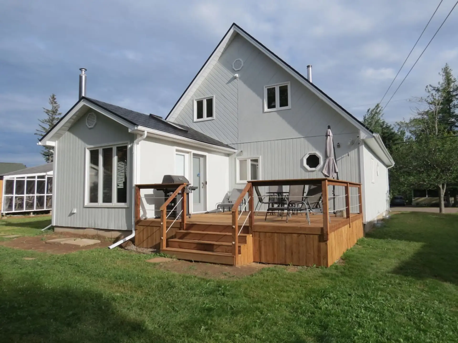 Large deck with BBQ and seating