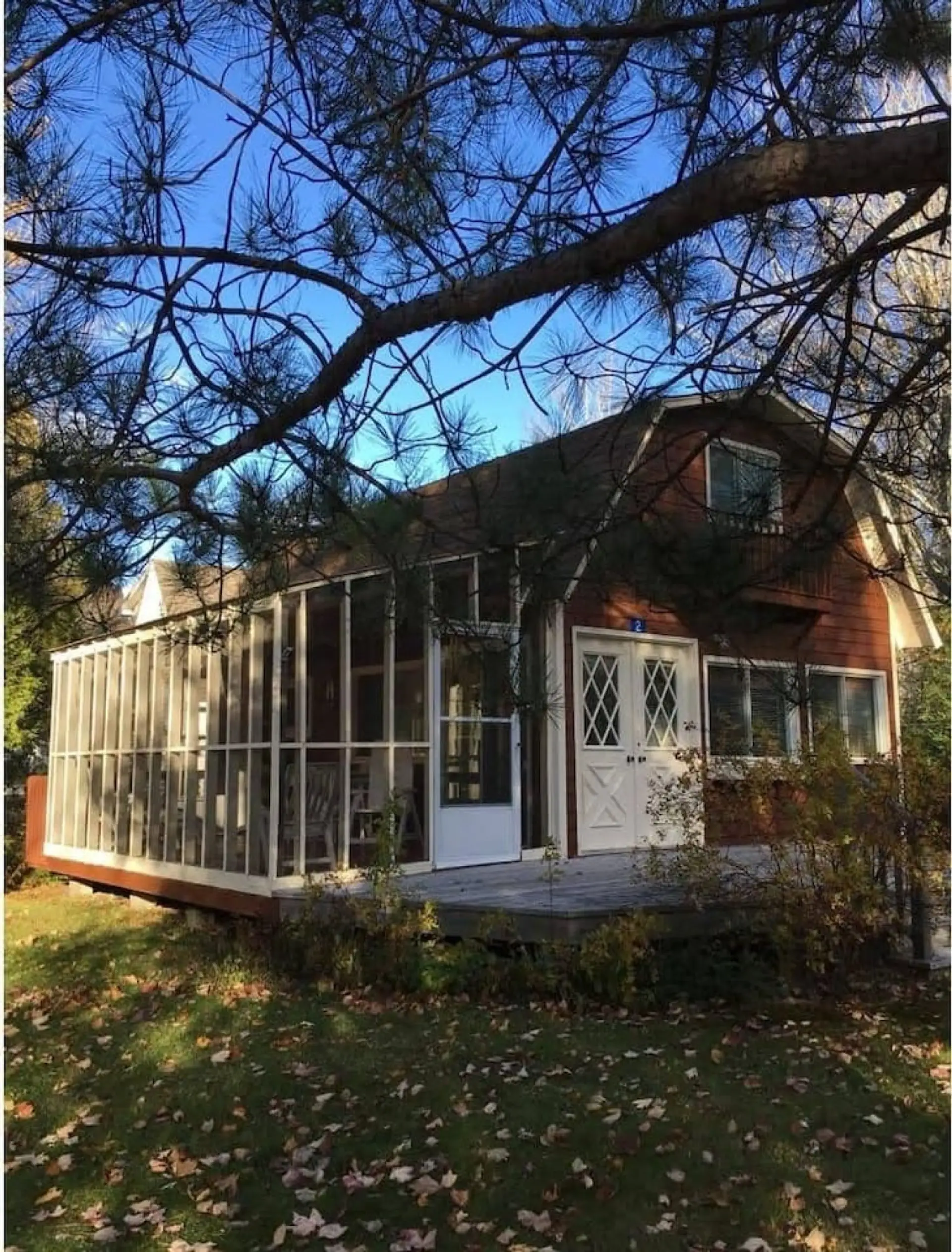 Closed porch perfect for outdoor dining