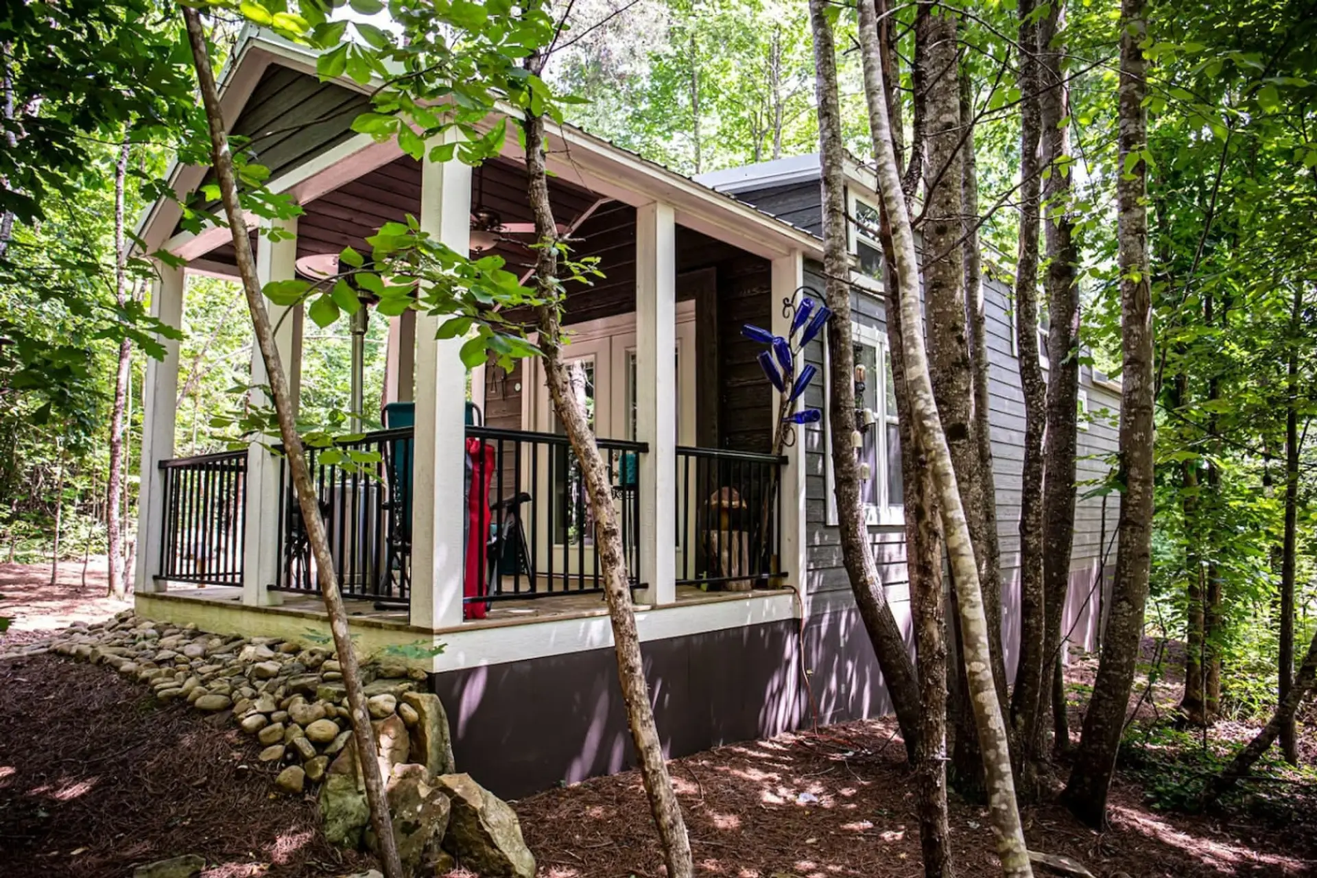 Enjoy a mountain morning with a cup of coffee on the porch. You might just see the family of deer passing through for a drink at the creek.