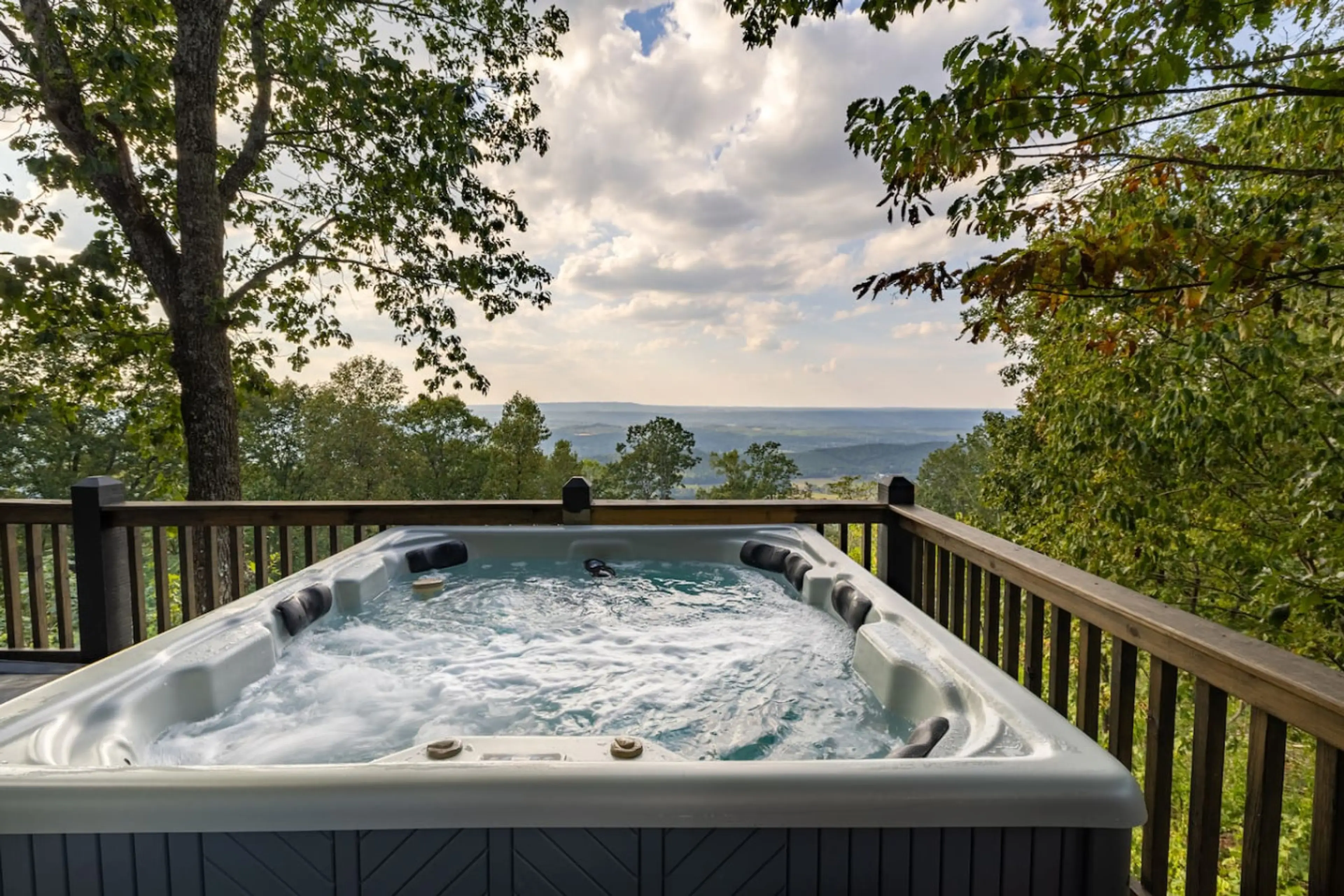 Soak in the hot tub on the back deck with views of the mountain and valleys.