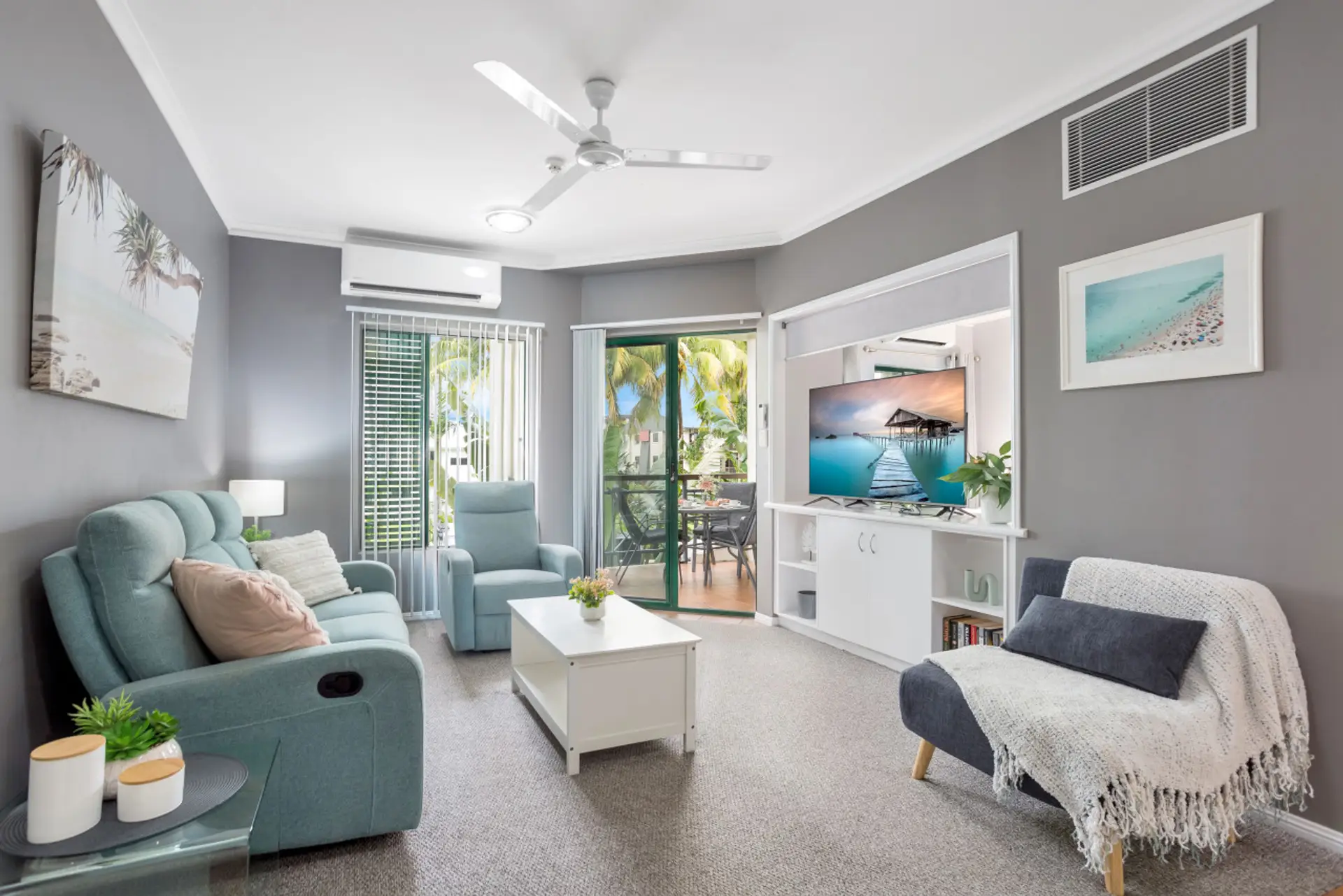 Relax and unwind in the cozy lounge room, featuring a 55" Smart TV for your entertainment.