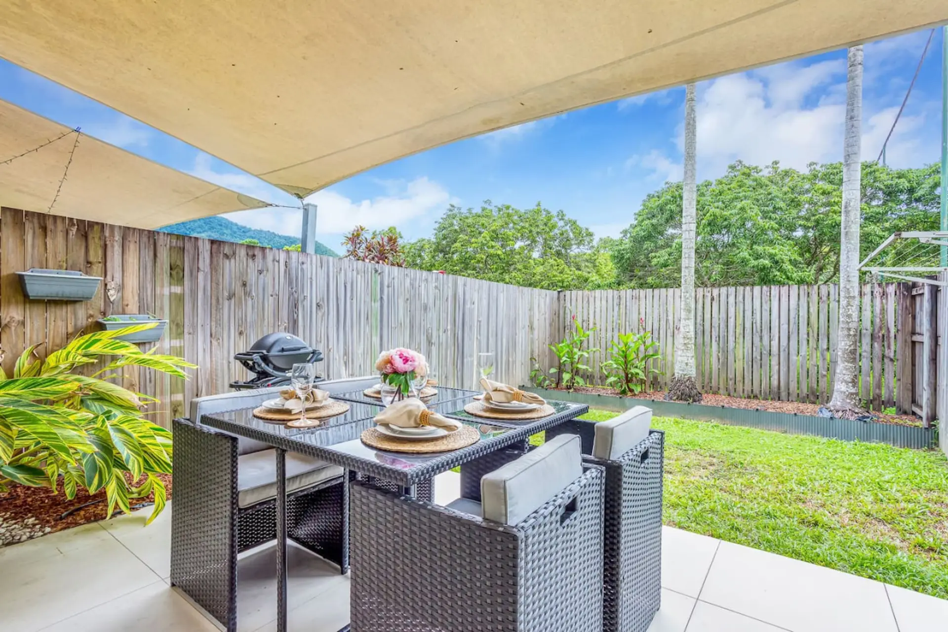 Outdoor Dining Oasis: Unwind in the scenic backyard, perfect for BBQs and delightful al fresco meals!