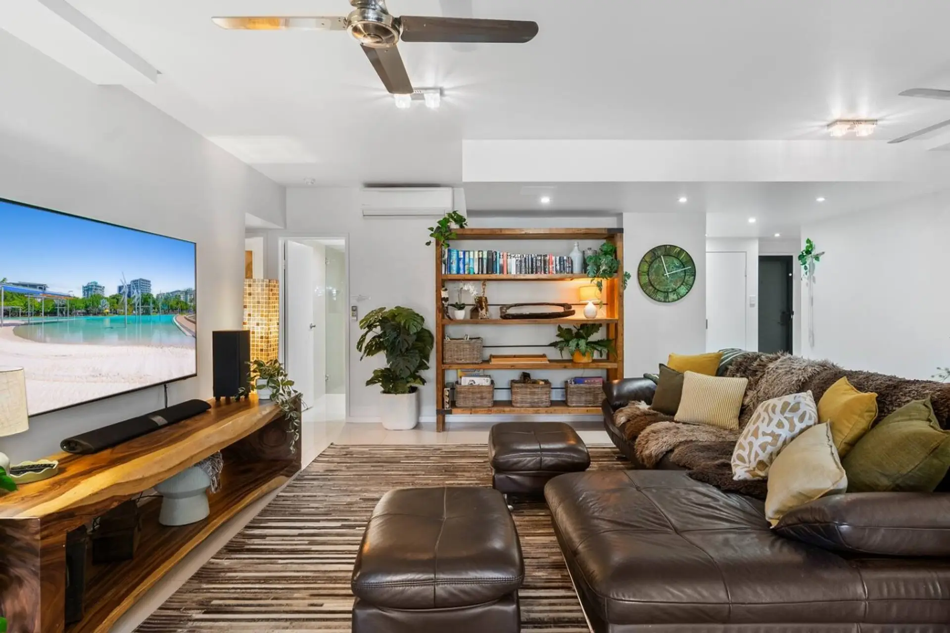 Sink into the oversized leather lounge, enjoy movie nights on the large Smart TV, and relax in this light filled living space. With air conditioning, ceiling fans and stylish décor, it is the perfect place to unwind together after every adventure.