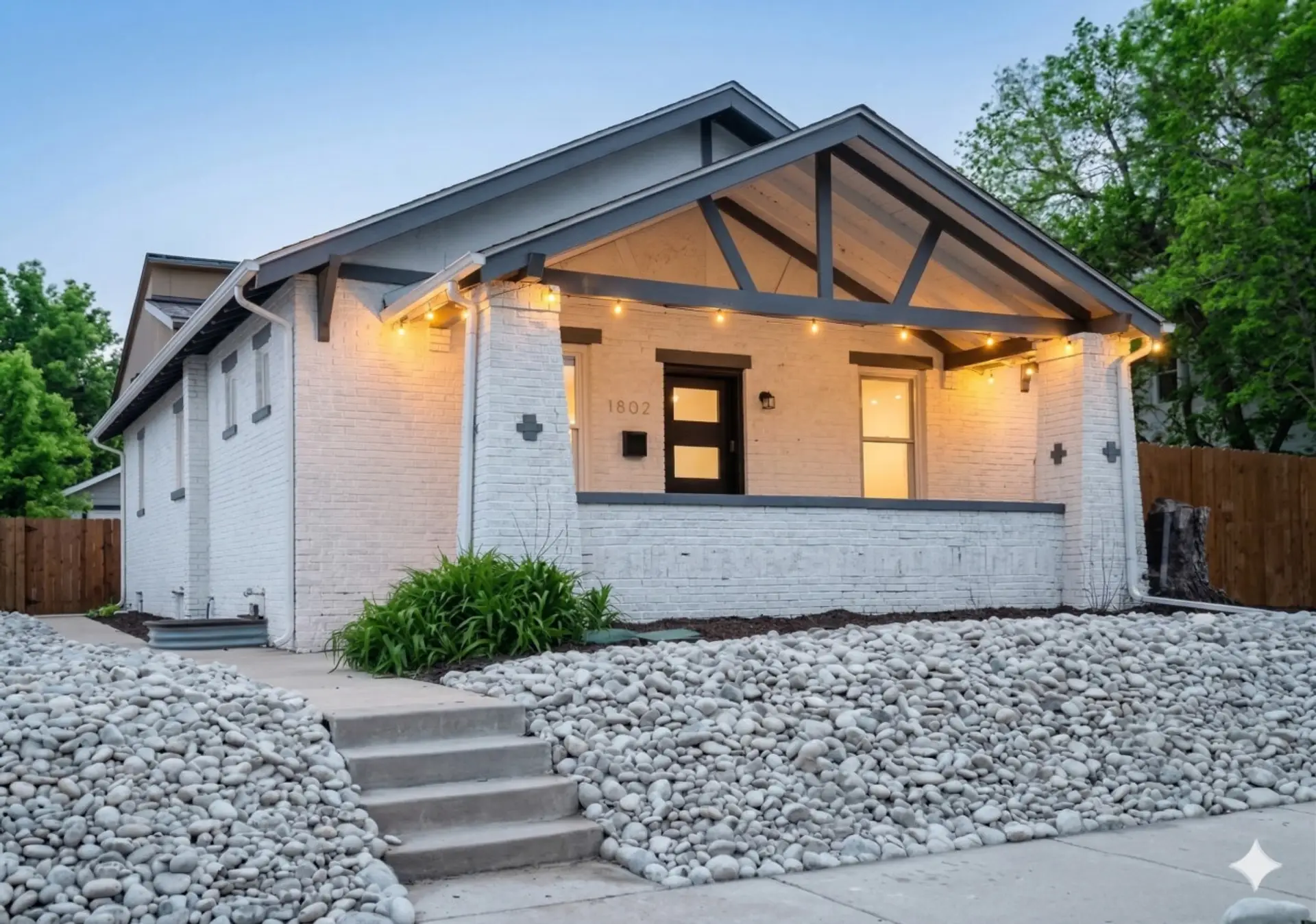 Charming 6BR Denver Highlands bungalow -- covered porch with string lights, perfect for groups