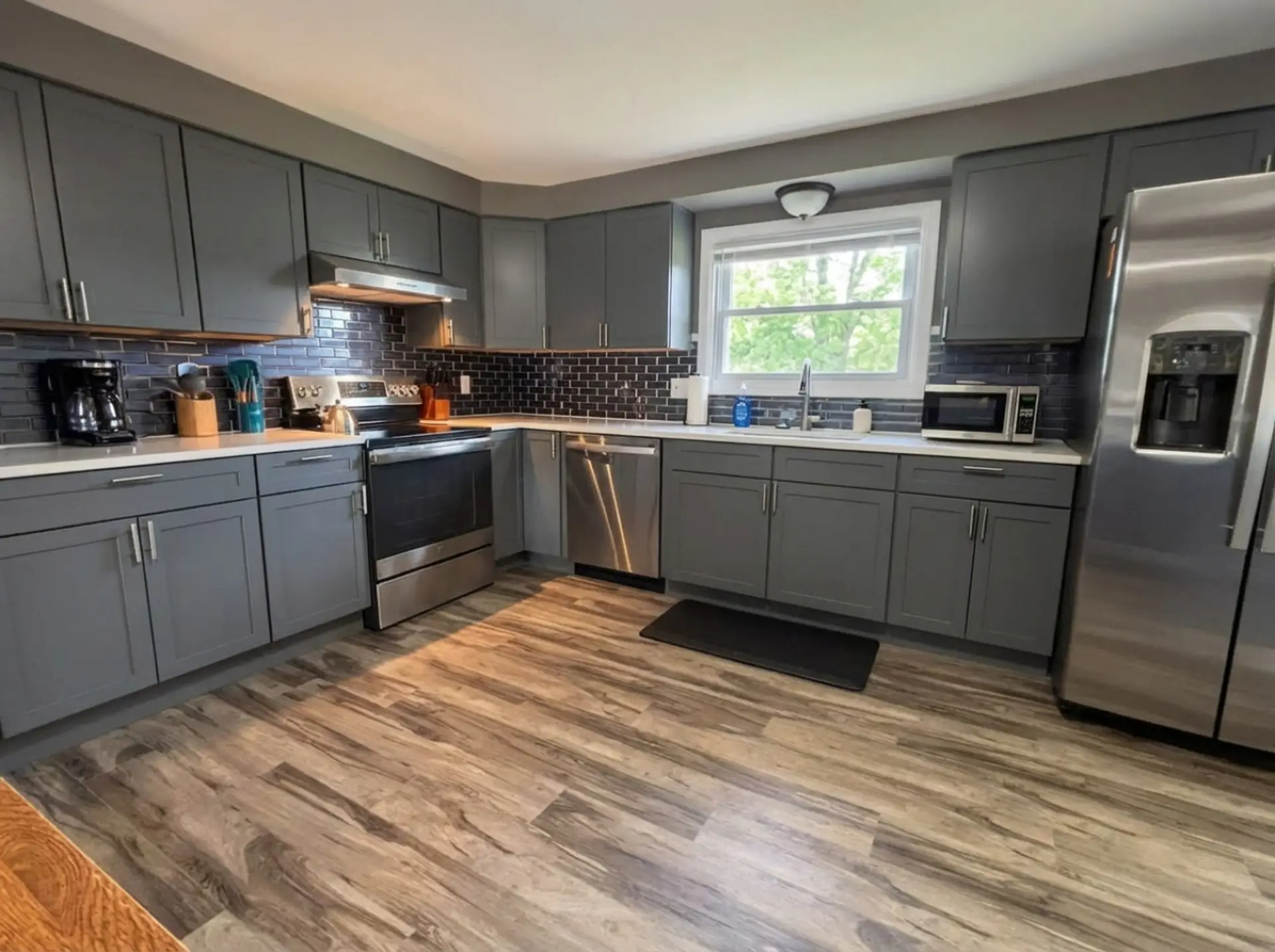 Fully stocked kitchen with everything needed for cooking, dining, and extended stays