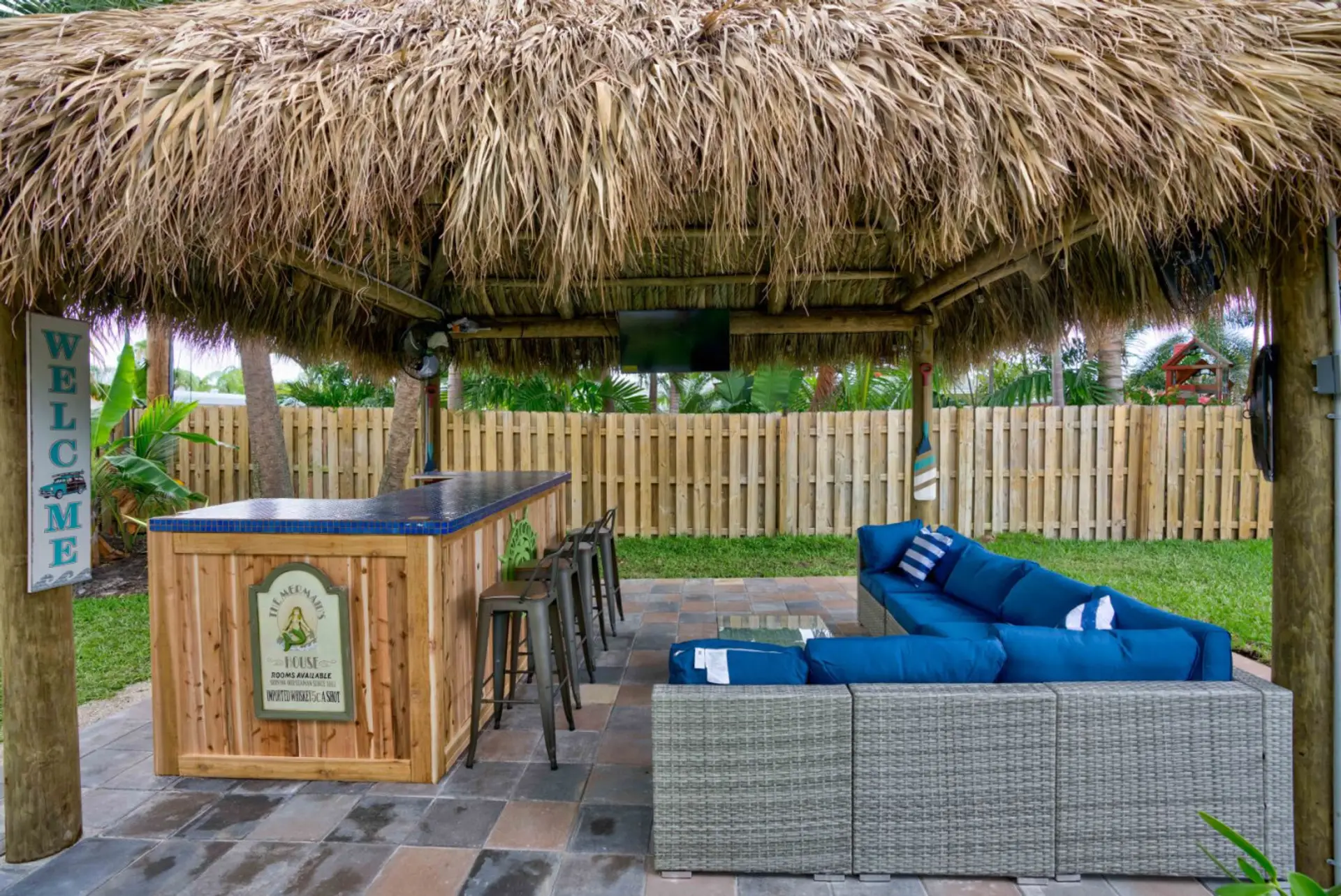 Enjoy your own backyard tiki bar for entertaining, relaxing, and making vacation memories.