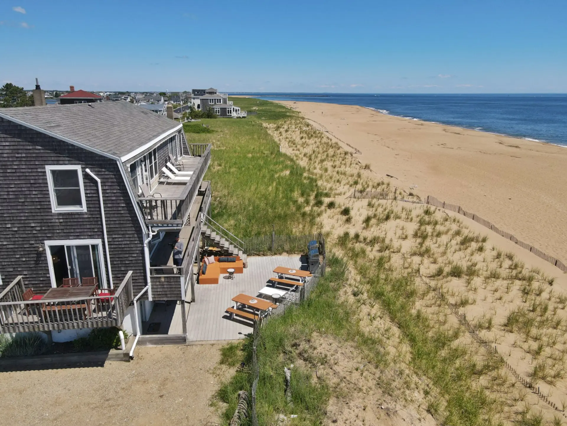An incredible beachfront setting with panoramic views of the coastline and surrounding area.