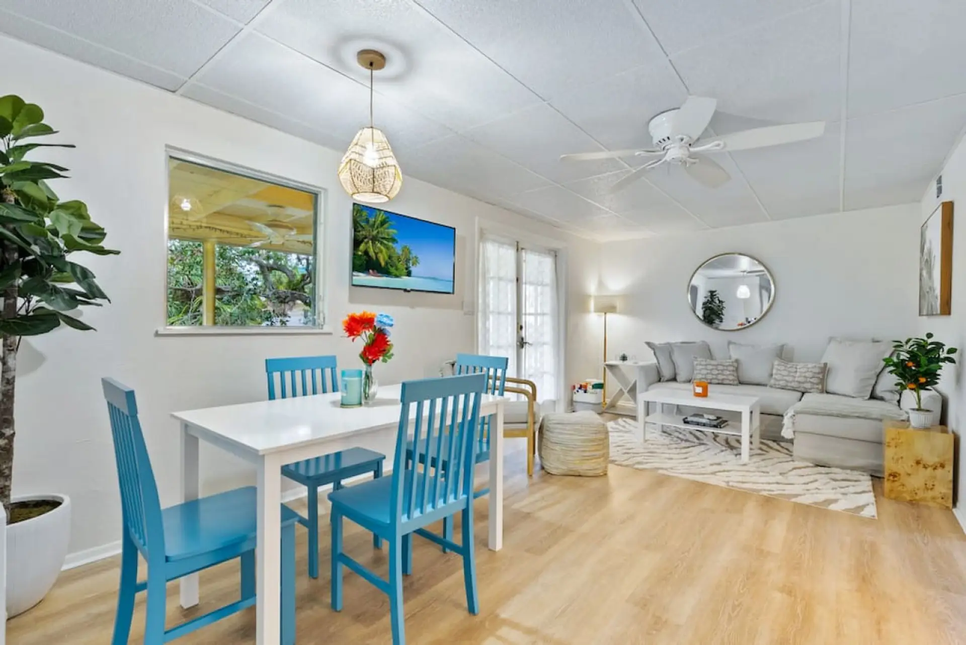 Open dining and living space with plenty of natural light.