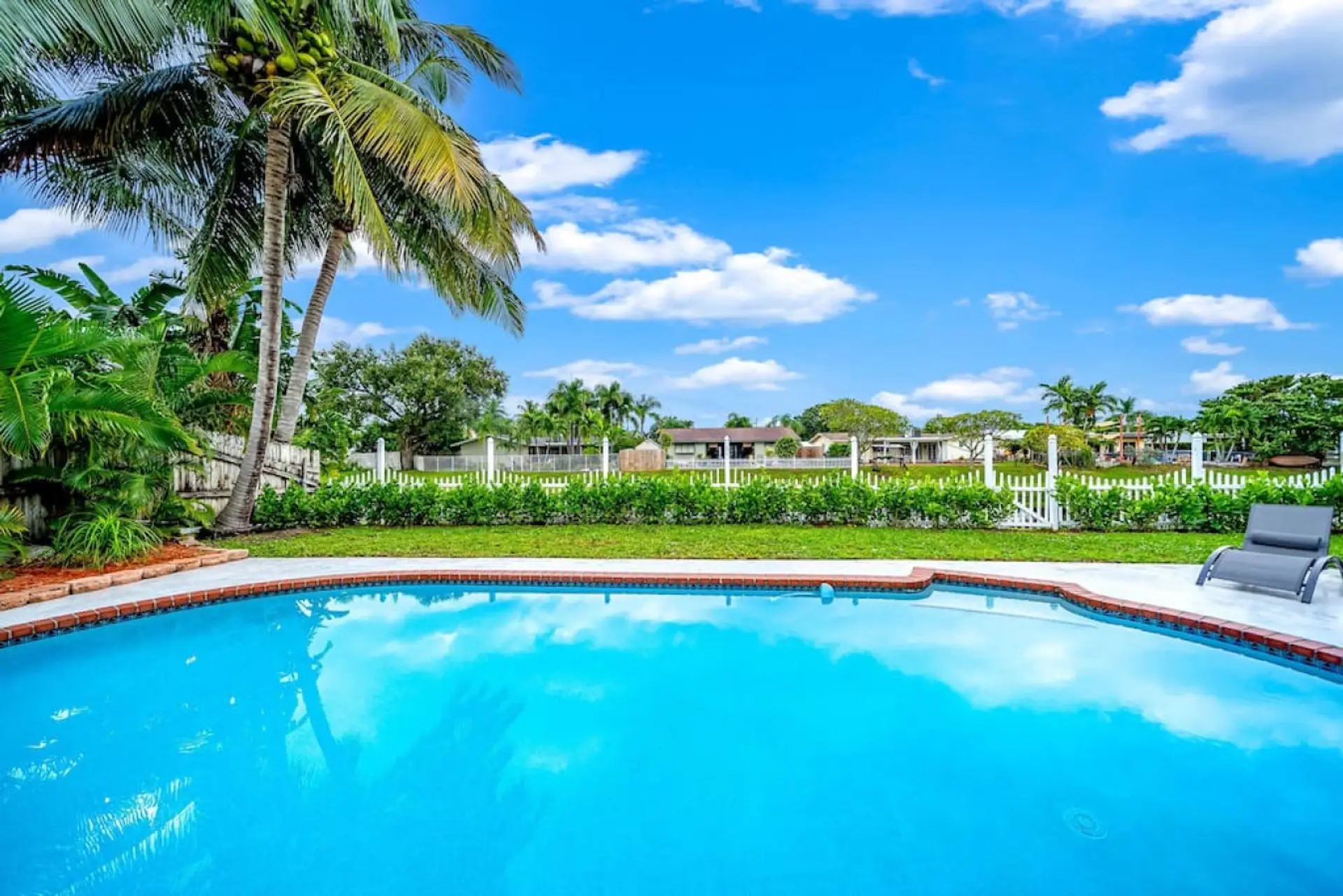 Private pool with spacious outdoor surroundings.