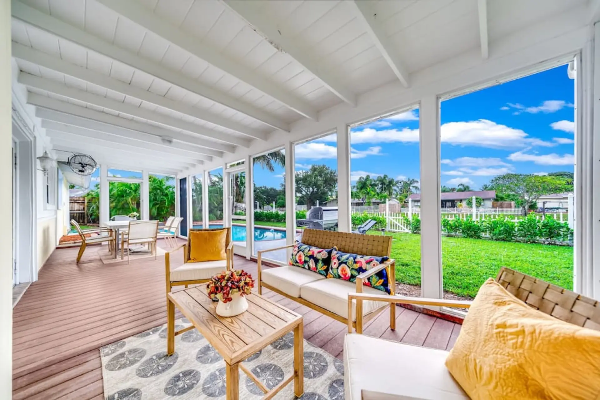 Relax in the covered lanai with comfortable seating and beautiful views of the pool.