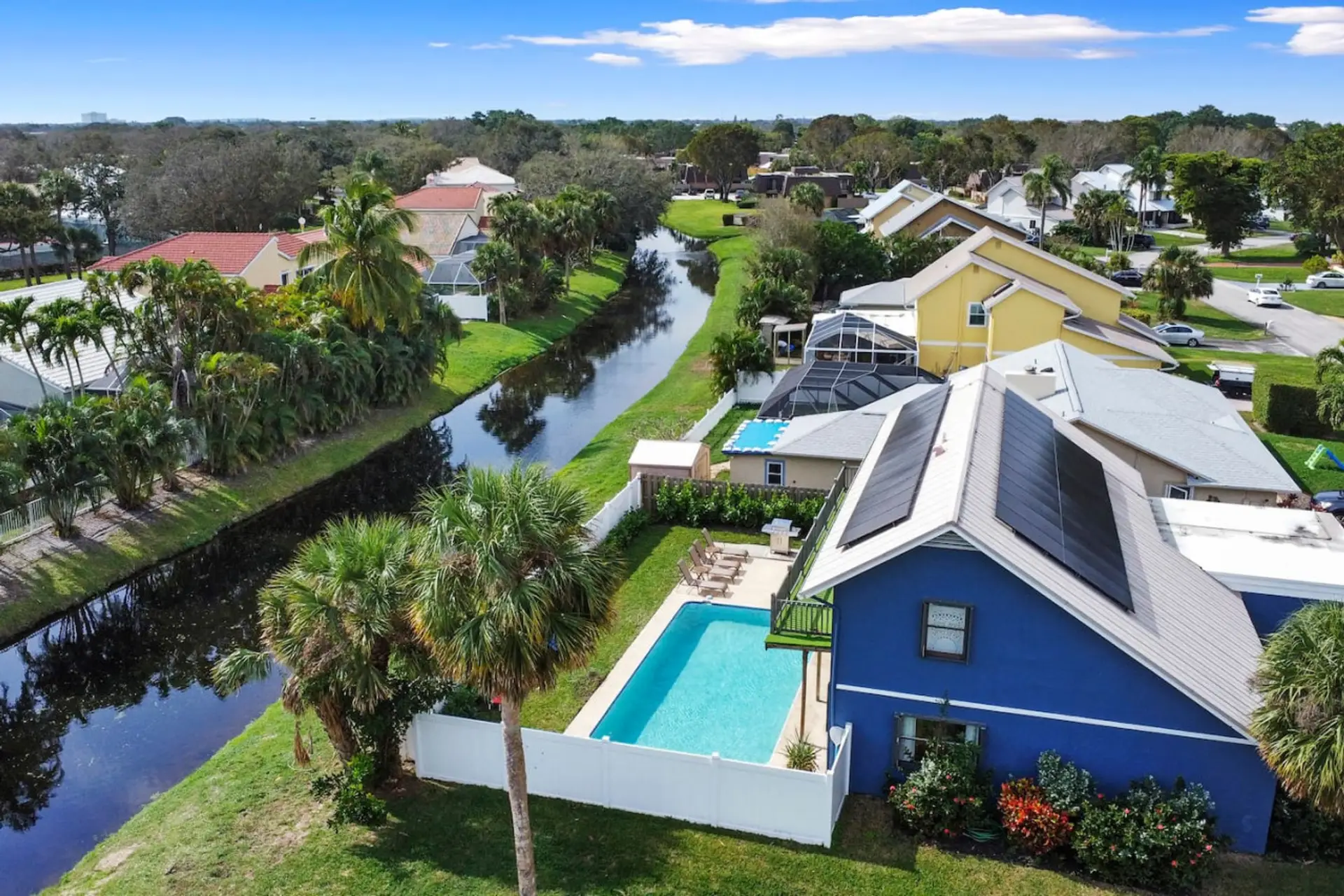 Stunning aerial view with private pool & waterfront setting