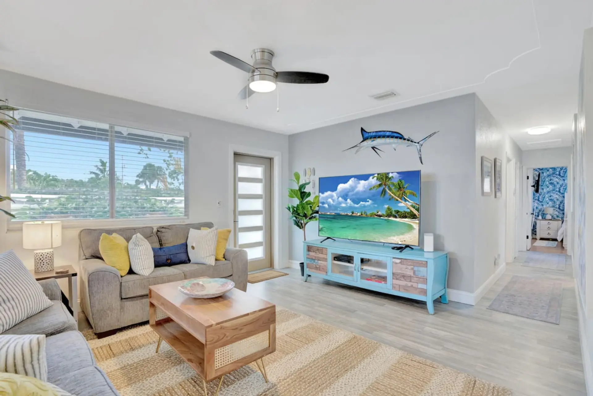 Bright coastal living room with Smart TV