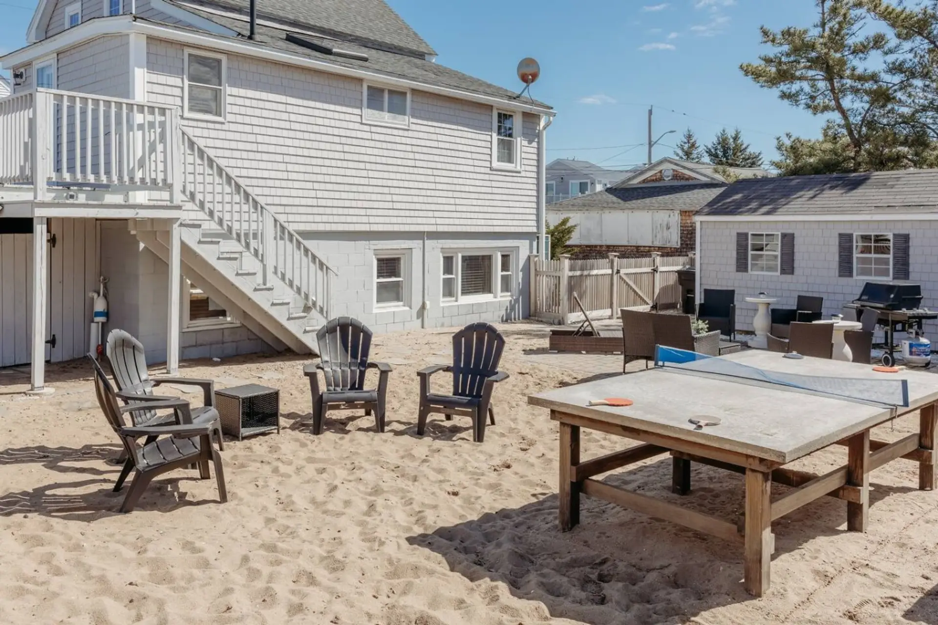 Spacious backyard patio with outdoor seating