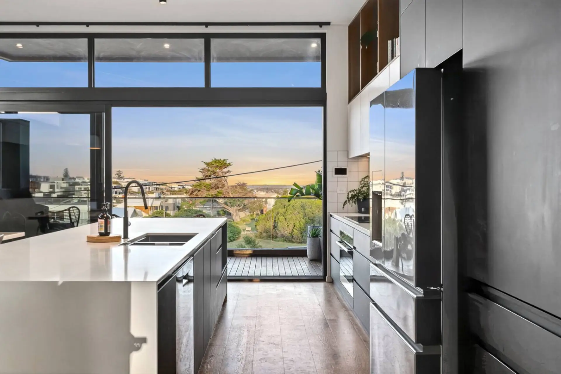 Open-plan living with panoramic coastal outlook