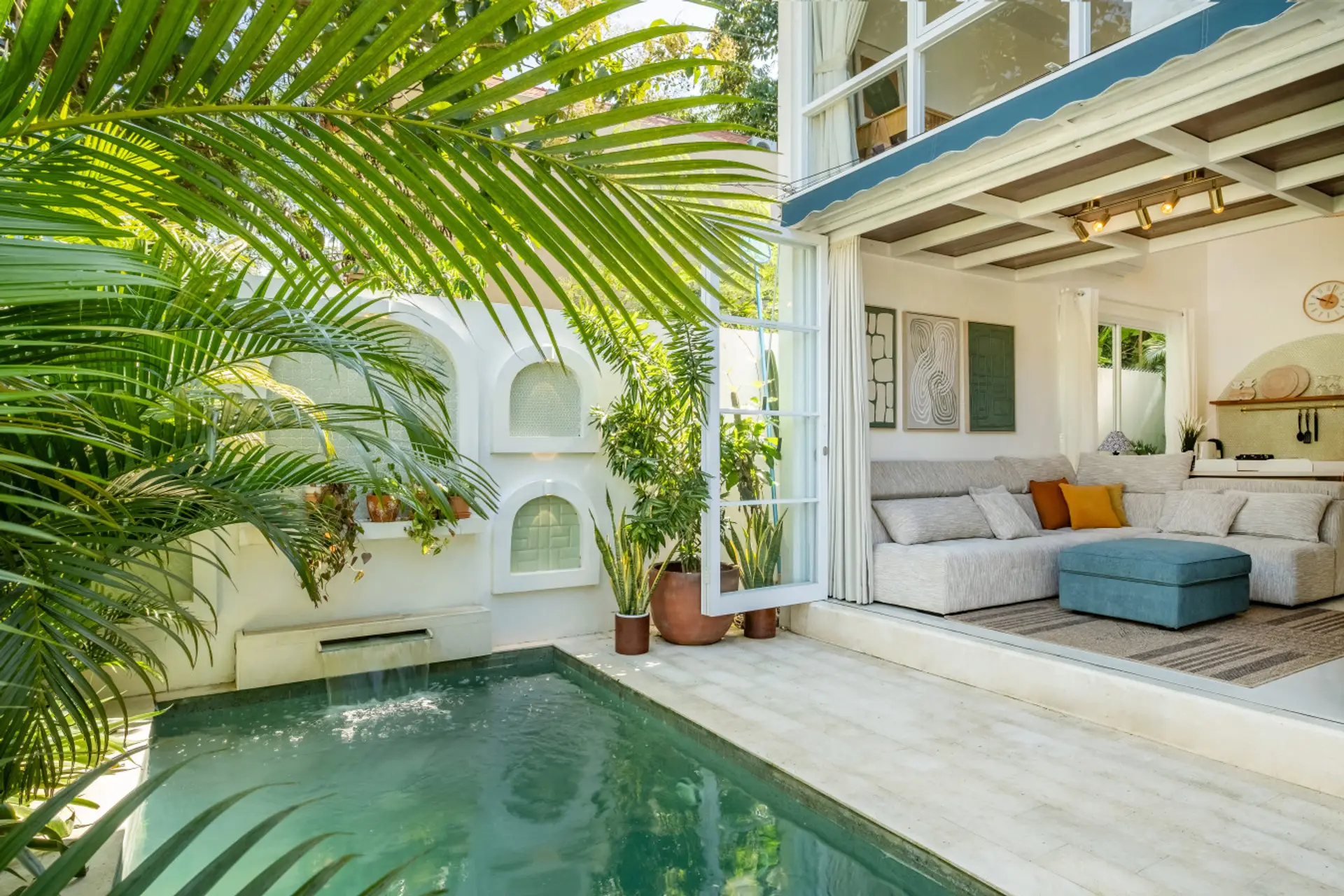Enjoy a relaxing private pool featuring a small waterfall