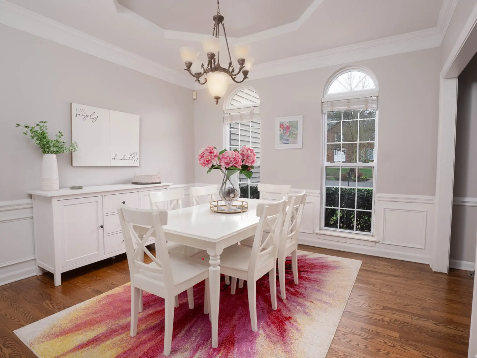 Tons of seating and sunlight in the dining room.