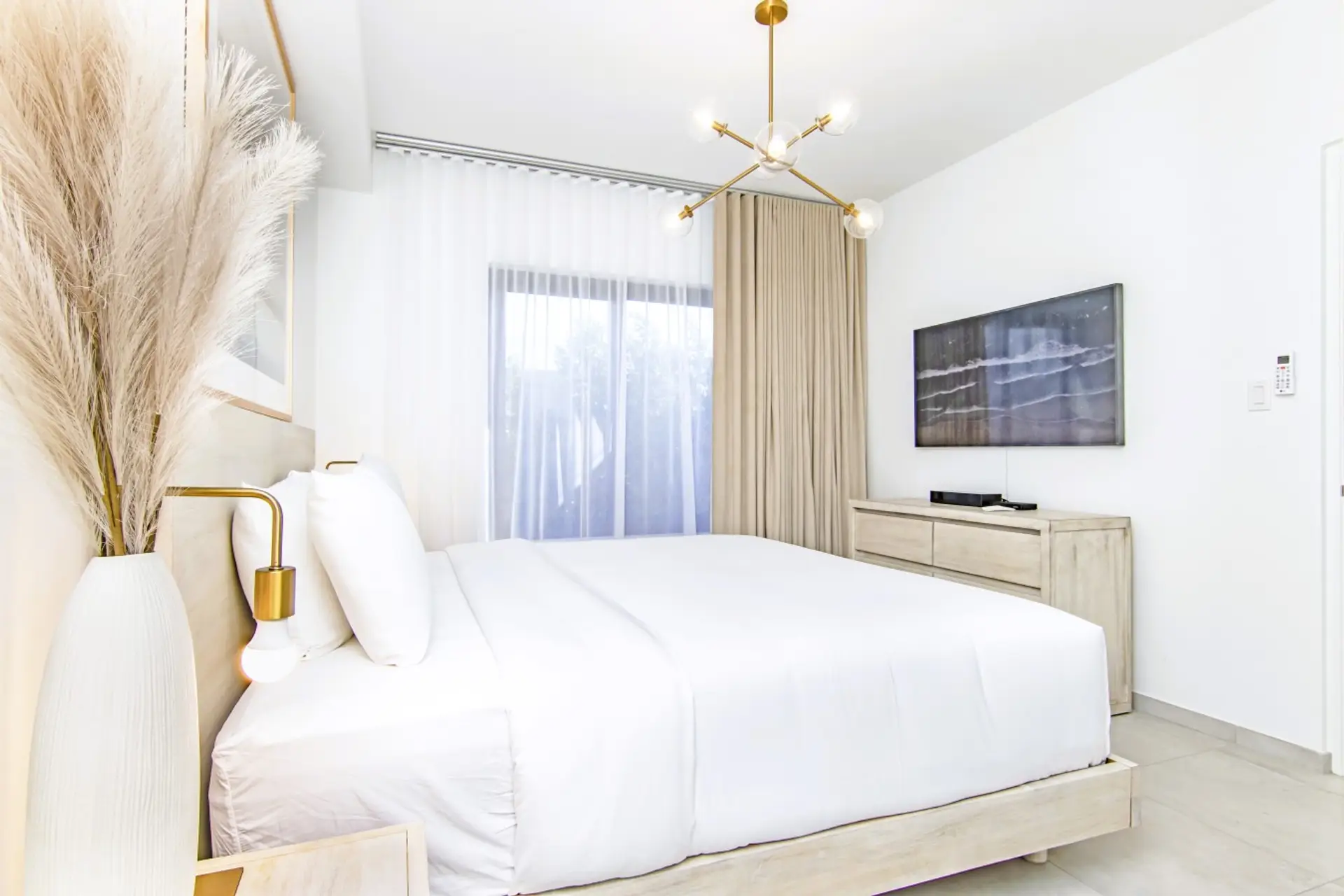 Master Bedroom | Wake up every morning with the sunny blue sky of Aruba right outside your window