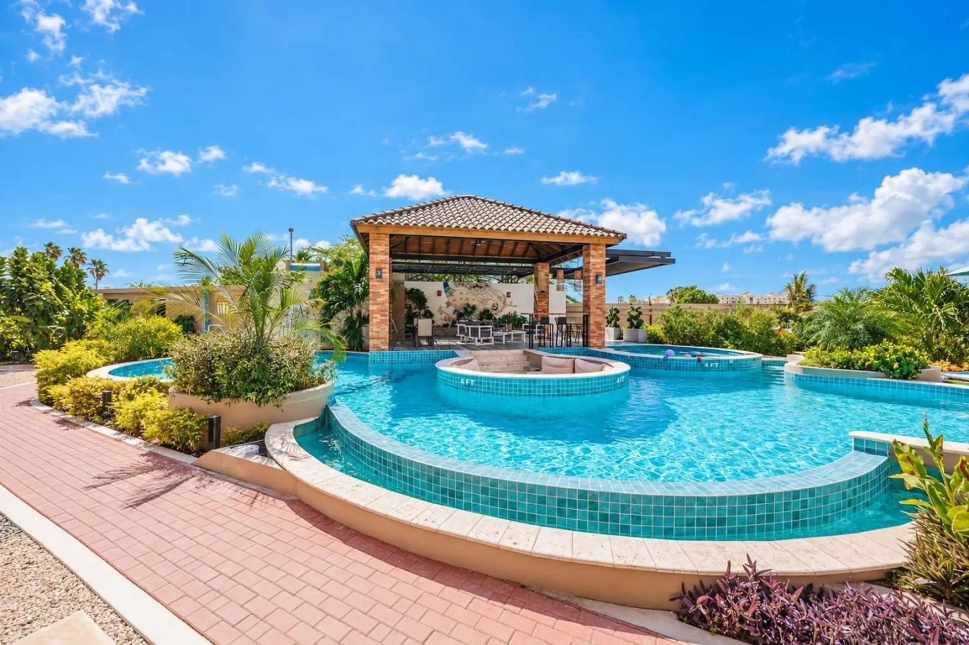 Relax in the Porta Al Sole residence pool