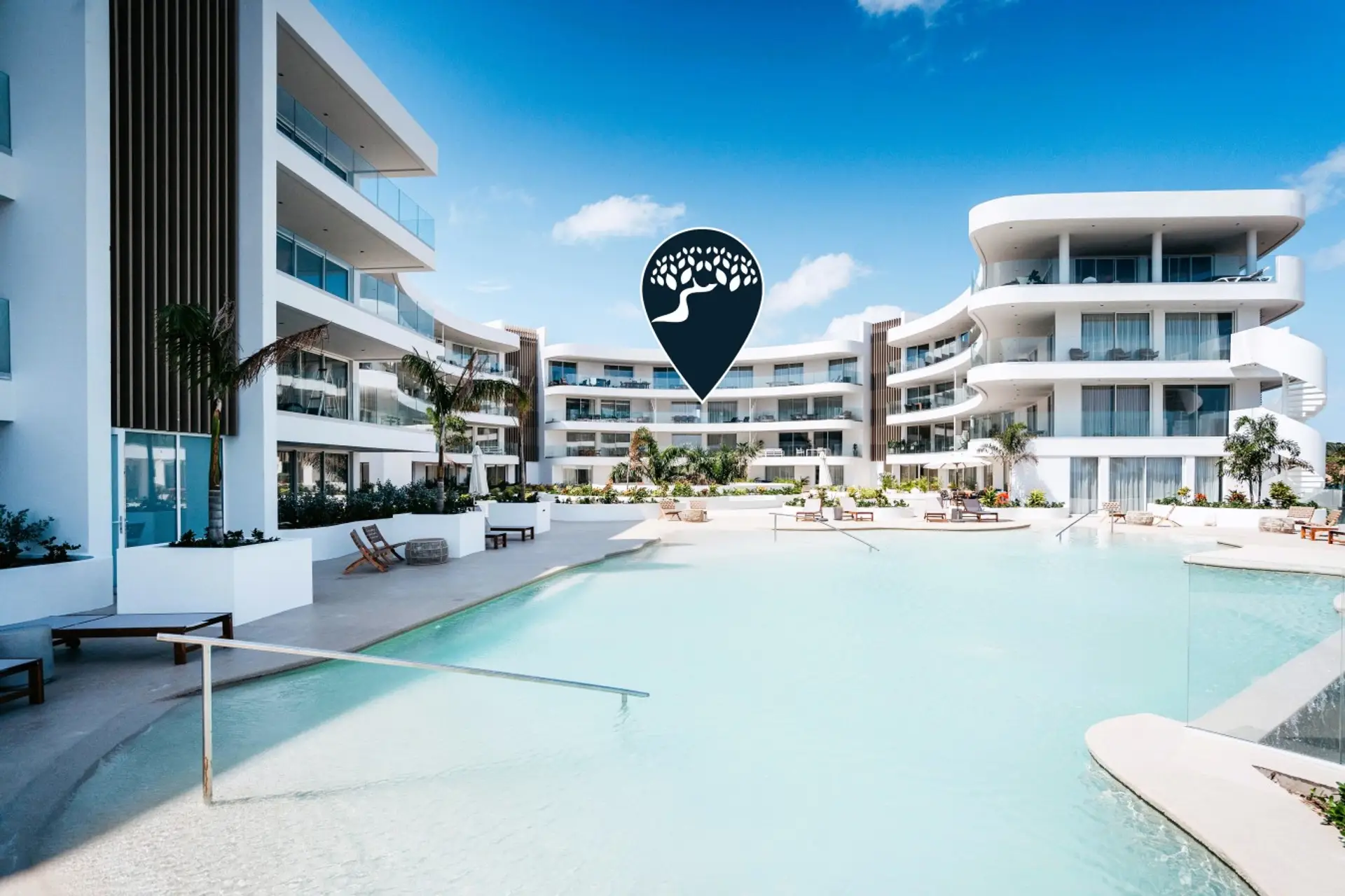 Large resort pool reserved for guests, perfect for a refreshing swim.