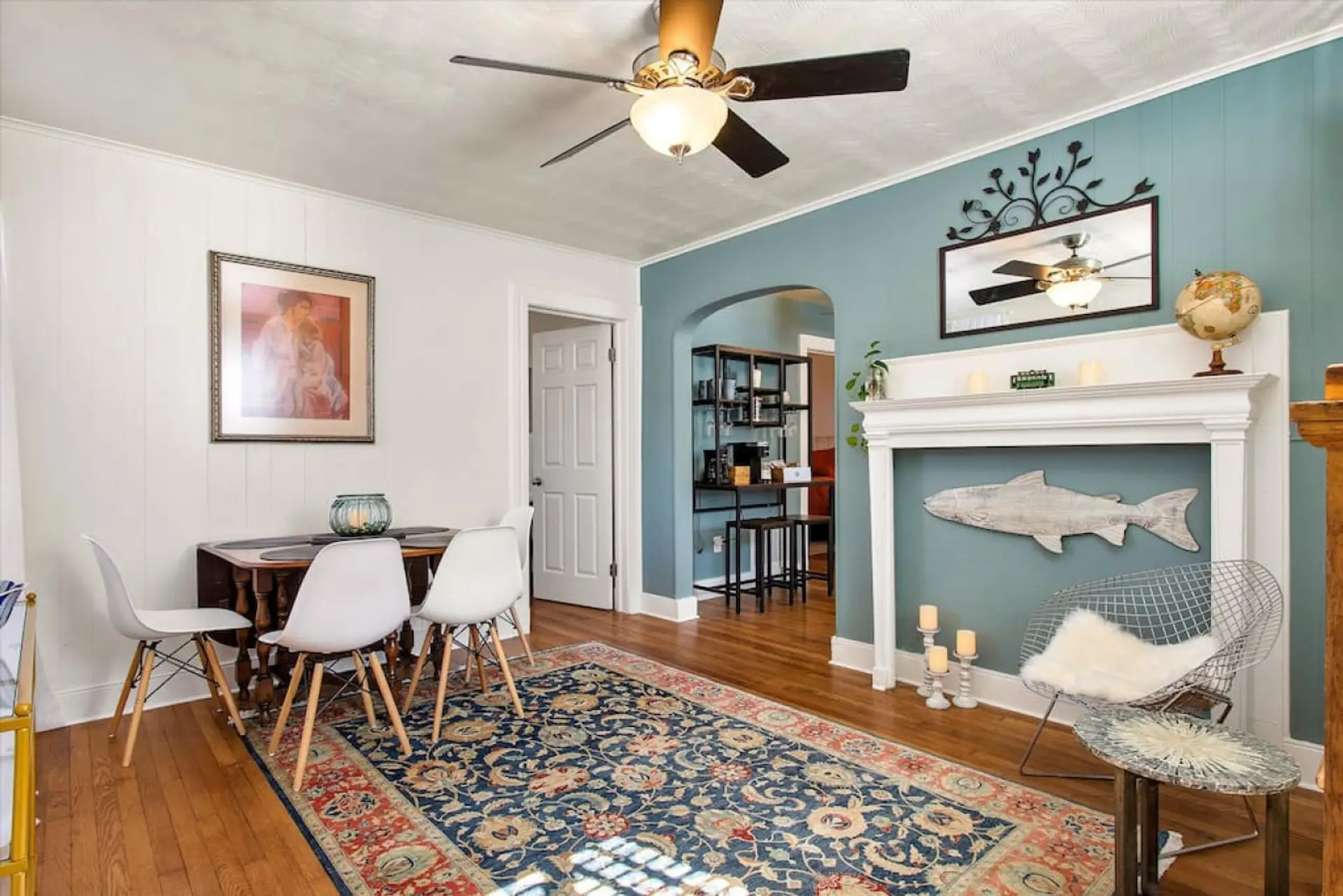 A warm and inviting space with a drop-leaf table for extra seating—perfect for intimate meals or game nights!