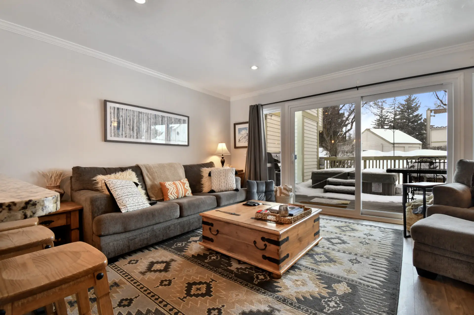 Cozy living area with gas fireplace and TV