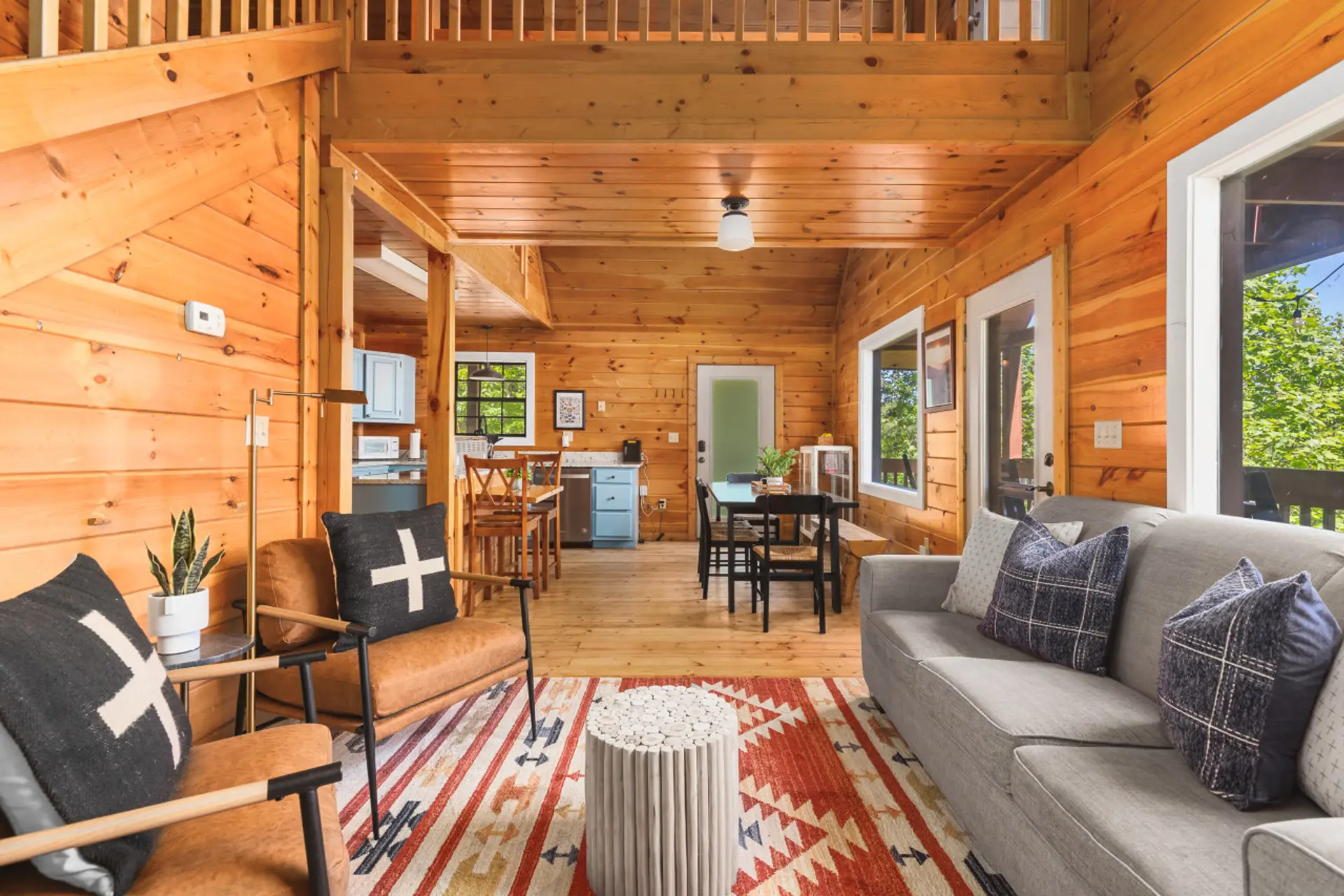 Cozy living room with a Smart TV, fireplace, and mountain views.