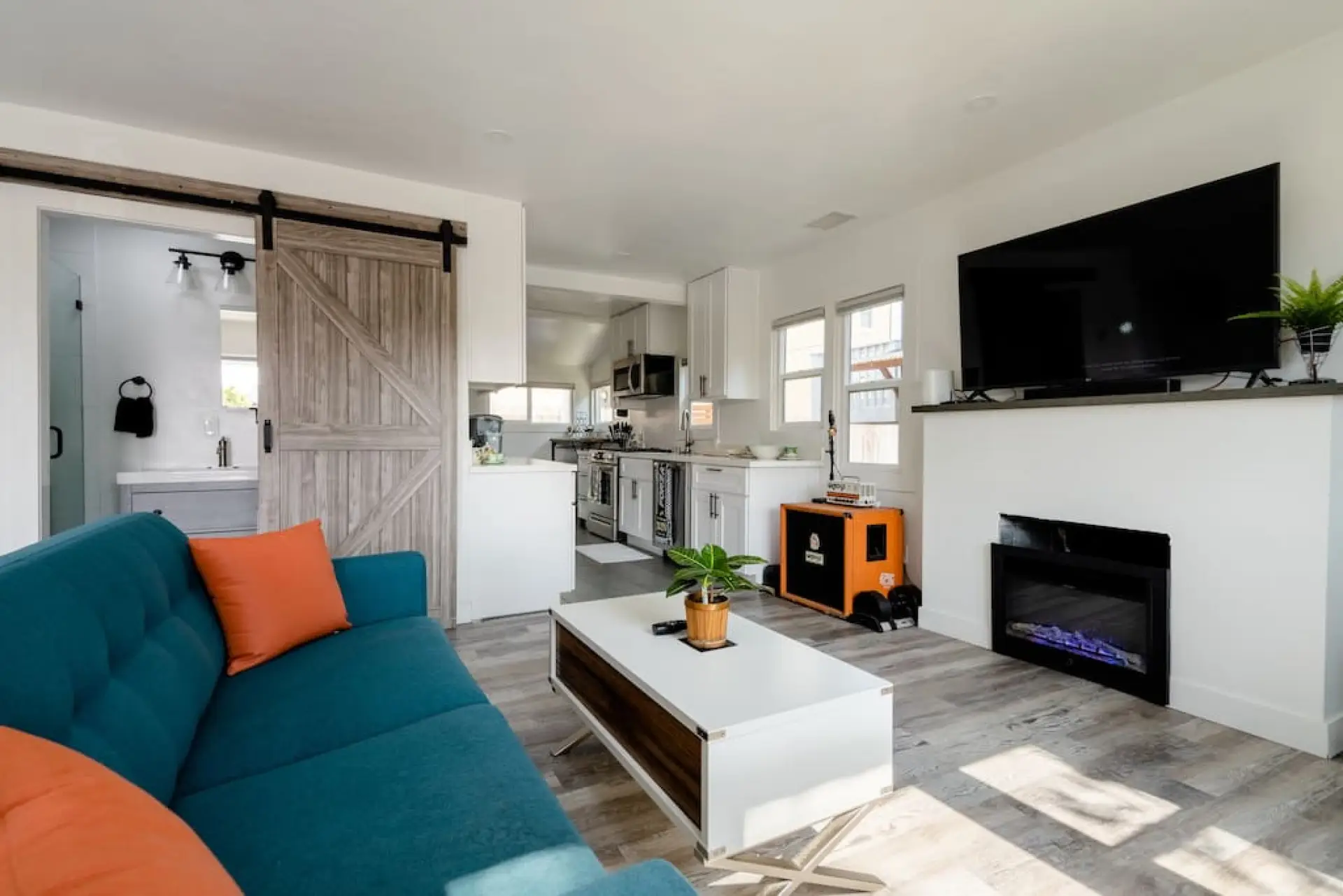Relax in our fun sunlit living room.