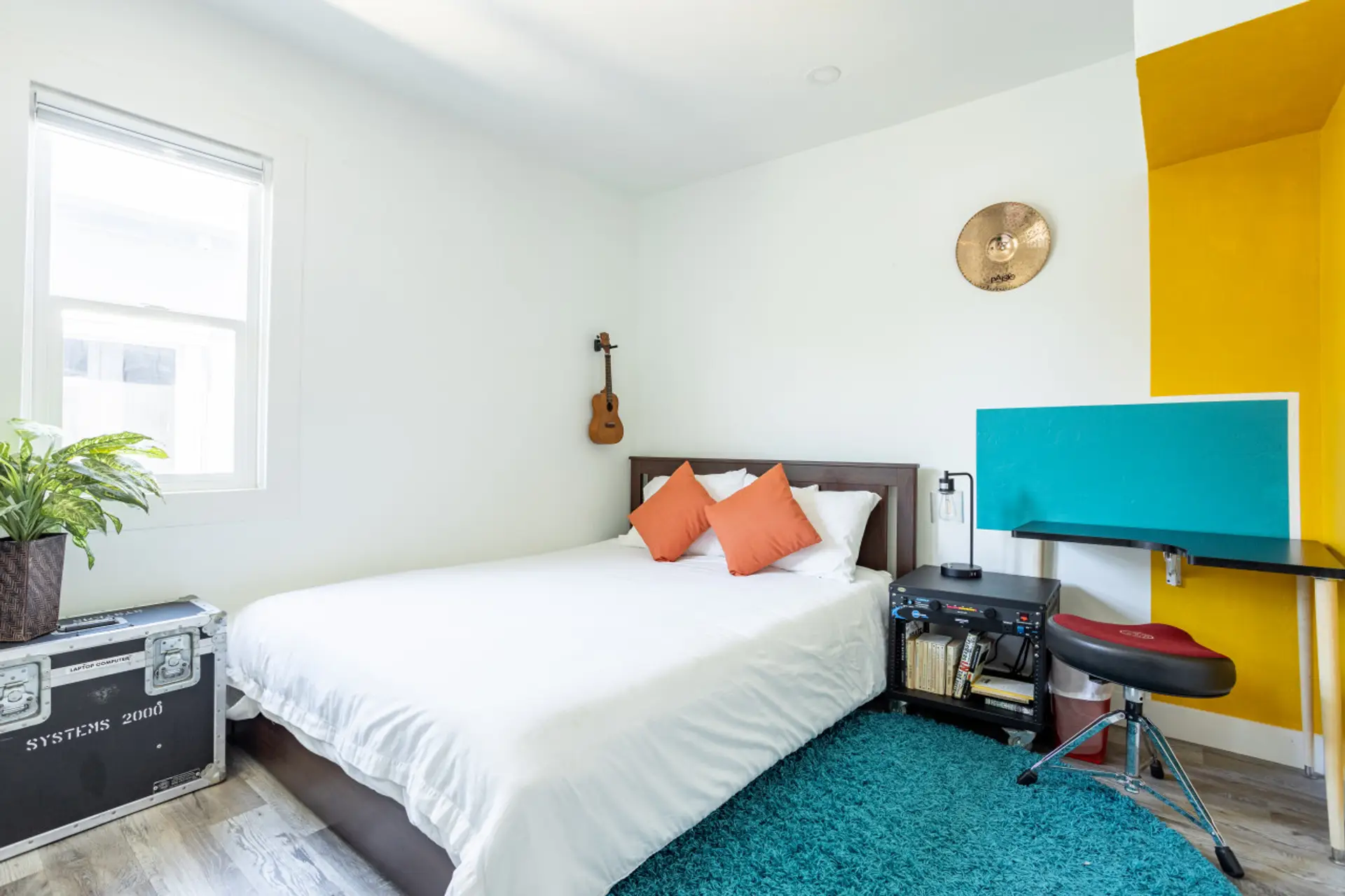 Your cozy queen bed with fold-down workdesk.