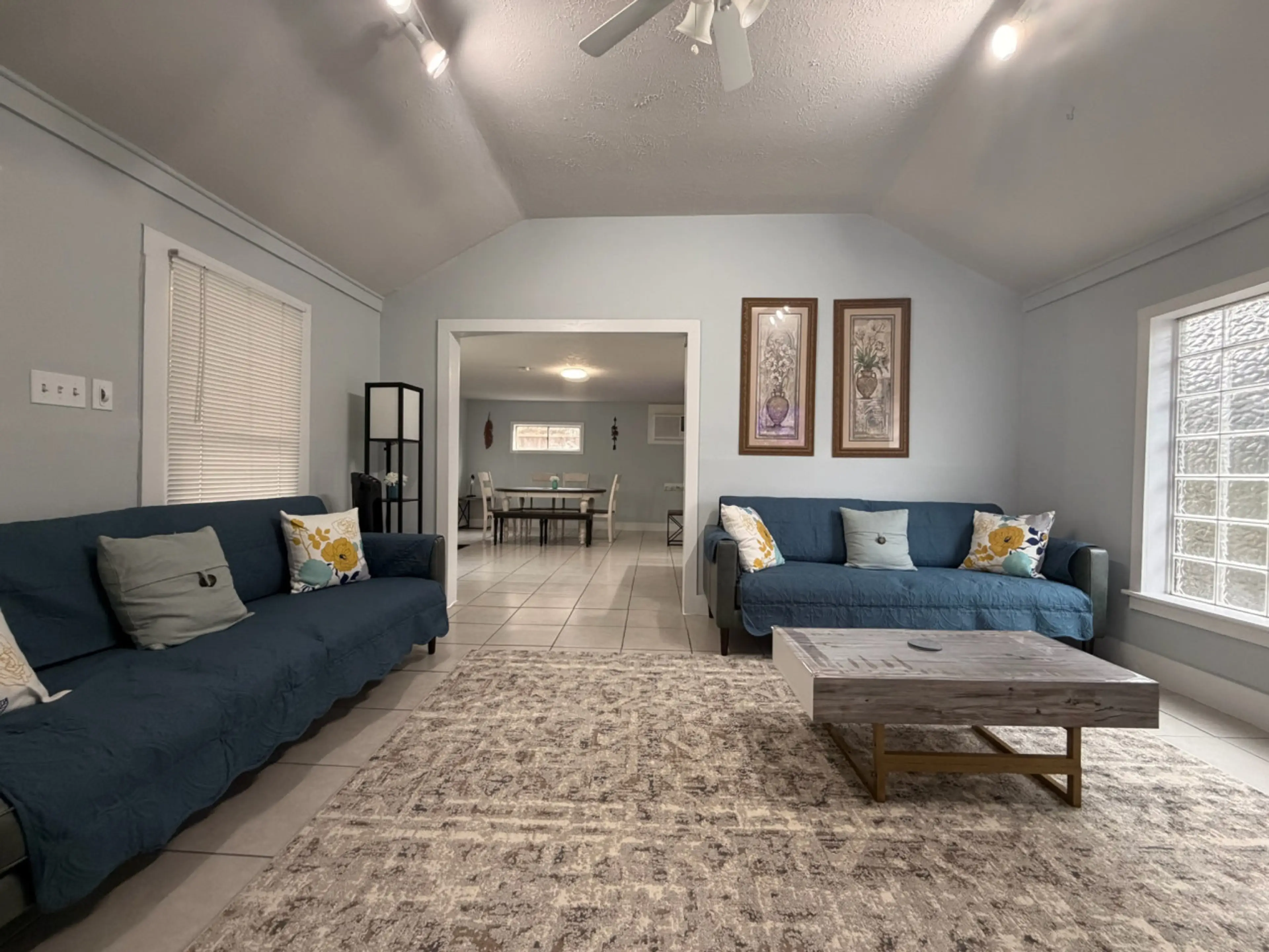 Enjoy a cozy, open living space with vaulted ceilings and ample seating—perfect for relaxing, entertaining, or spending quality time together.