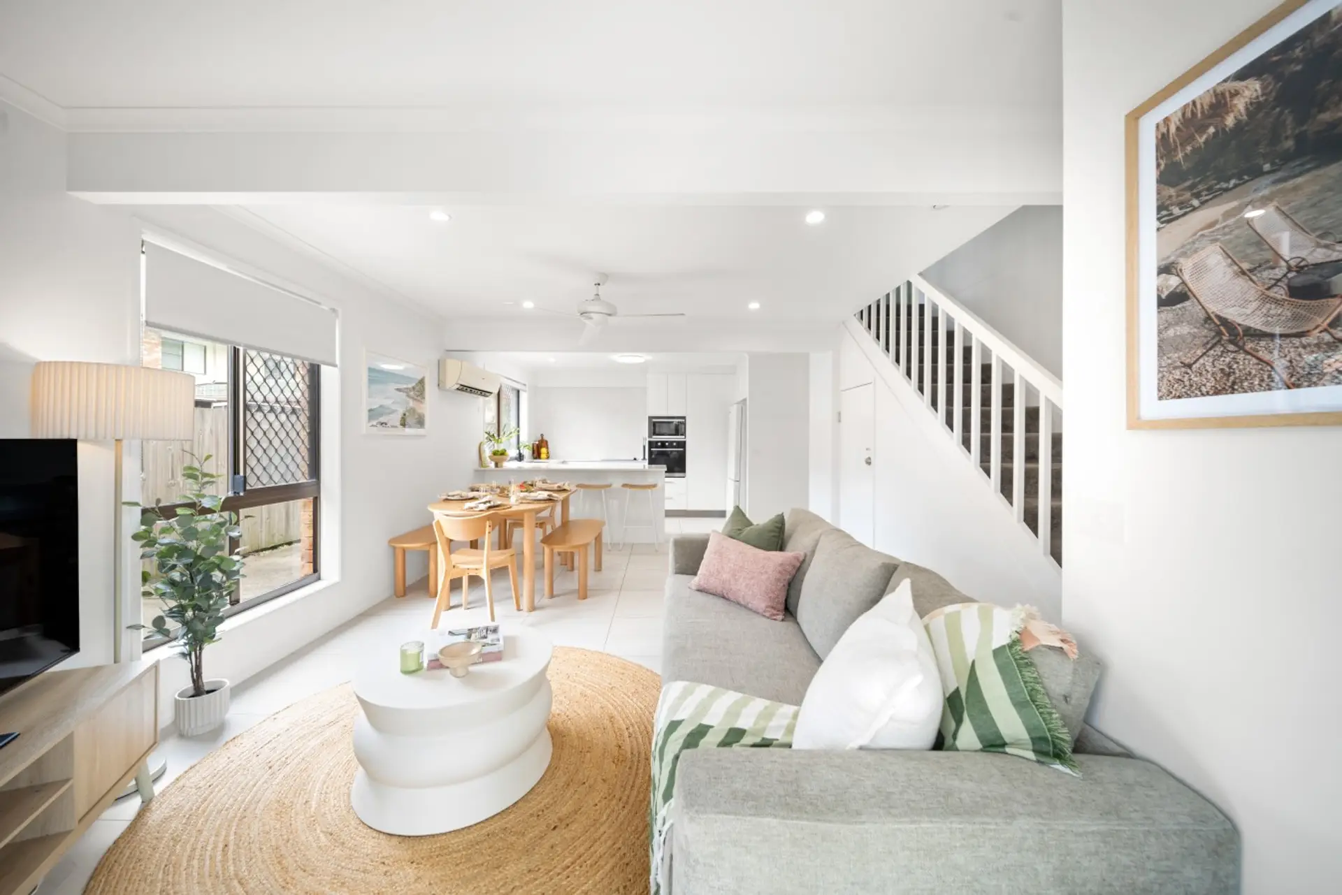 Open plan kitchen, living and dining areas with front garden access
