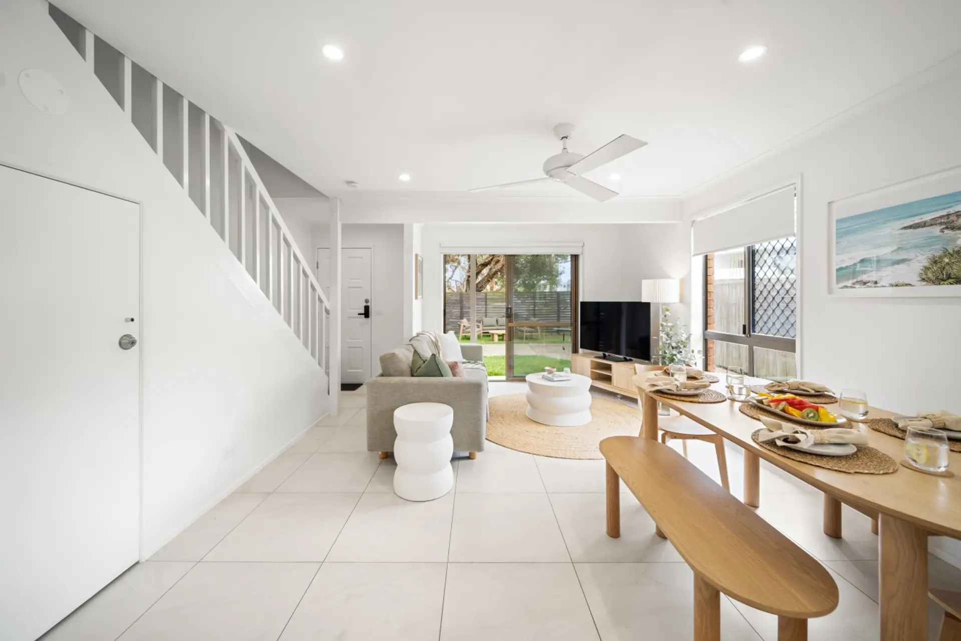 Open plan kitchen, living and dining areas with front garden access