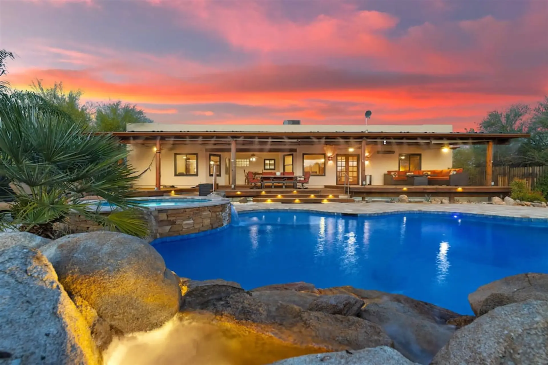 Escape to your own desert oasis in Cave Creek with a stunning private pool and hot tub designed for year-round relaxation and fun.